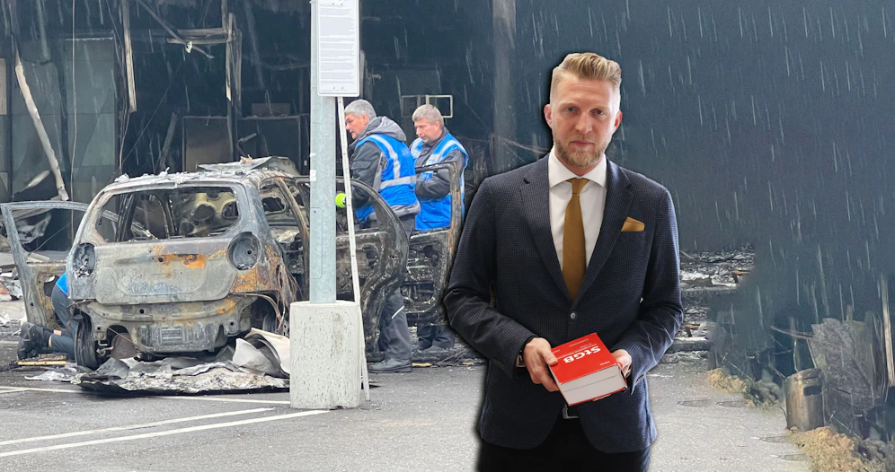 Das verbrannte Fahrzeug vor dem Supermarkt, Verteidiger Roman Tenschert.