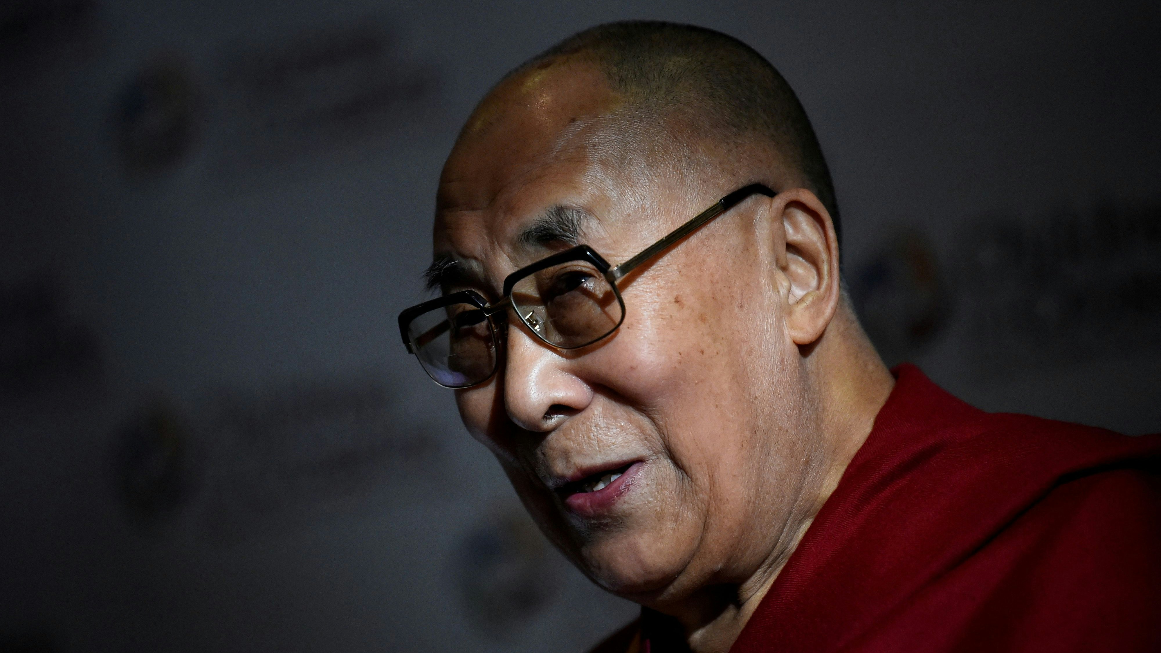 FILE PHOTO: Tibetan spiritual leader the Dalai Lama, Patron of Children in Crossfire, speaks during a press conference in Londonderry, Northern Ireland September 11, 2017. REUTERS/Clodagh Kilcoyne/File Photo