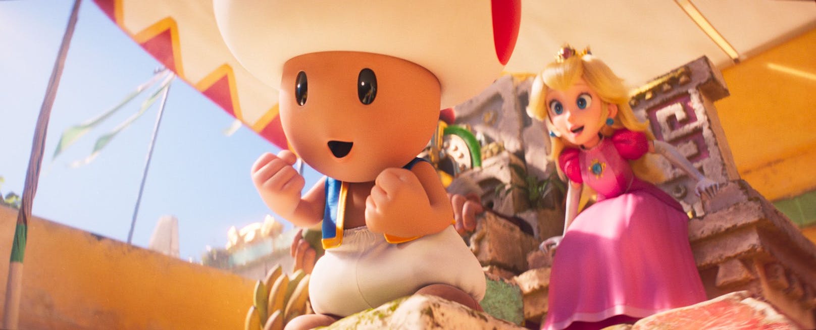 Toad und Peach feuern Mario tatkräftig an.