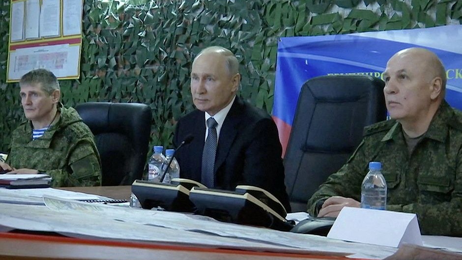 Russian President Vladimir Putin with Colonel General Mikhail Teplinsky (L), commander of the Airborne Forces, and Colonel General Oleg Makarevich, commander of the Dnieper Group of Forces, visit the headquarters of the "Dnieper" army group in the Kherson Region, Russian-controlled Ukraine, in this still image taken from handout video released on April 18, 2023. Kremlin.ru/Handout via REUTERS ATTENTION EDITORS - THIS IMAGE WAS PROVIDED BY A THIRD PARTY. NO RESALES. NO ARCHIVES. MANDATORY CREDIT.