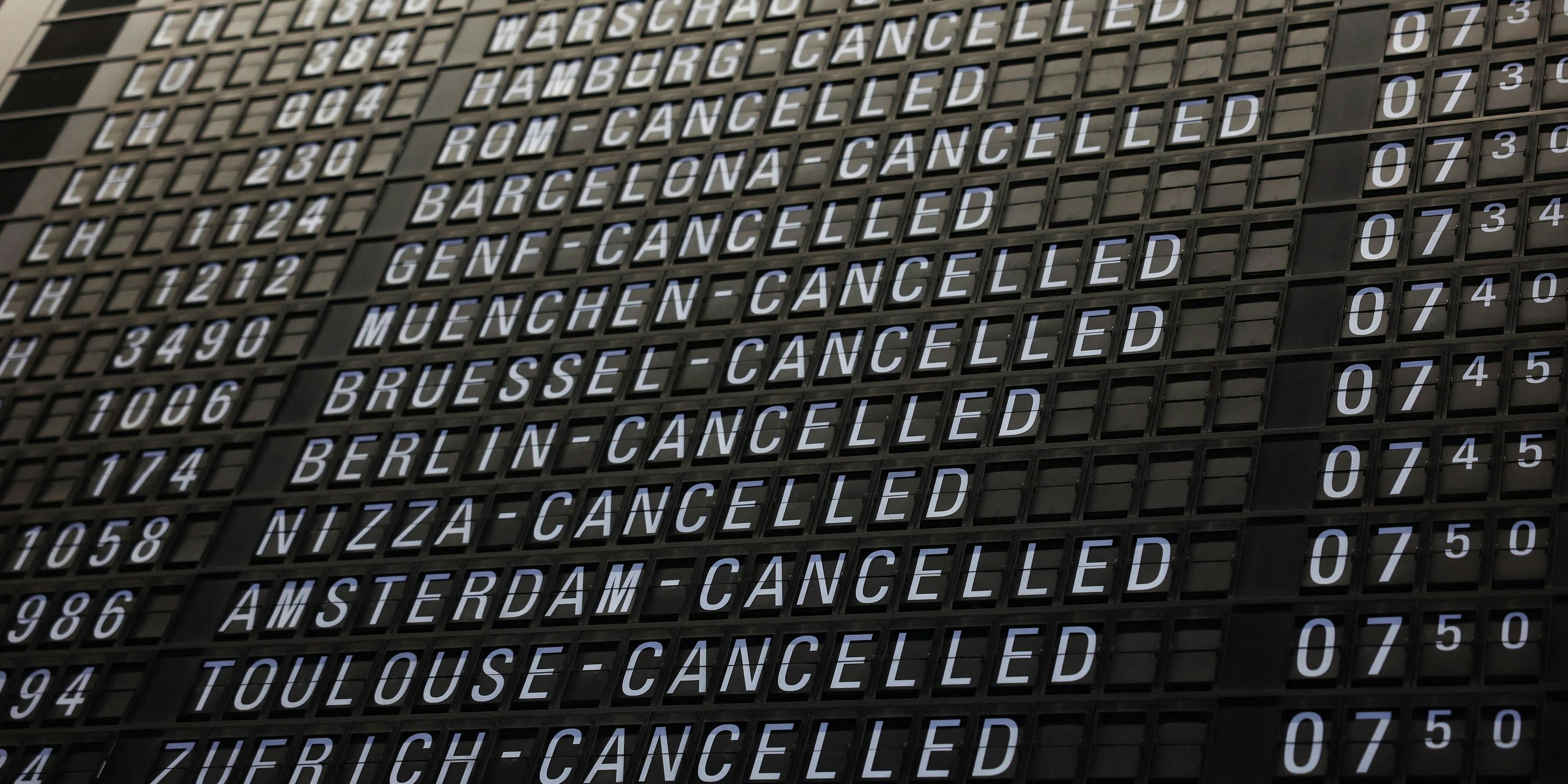 A display board shows the list of cancelled flights at Frankfurt airport during a nationwide strike called by the German trade union Verdi over a wage dispute in Frankfurt, Germany, March 27, 2023. REUTERS/Kai Pfaffenbach