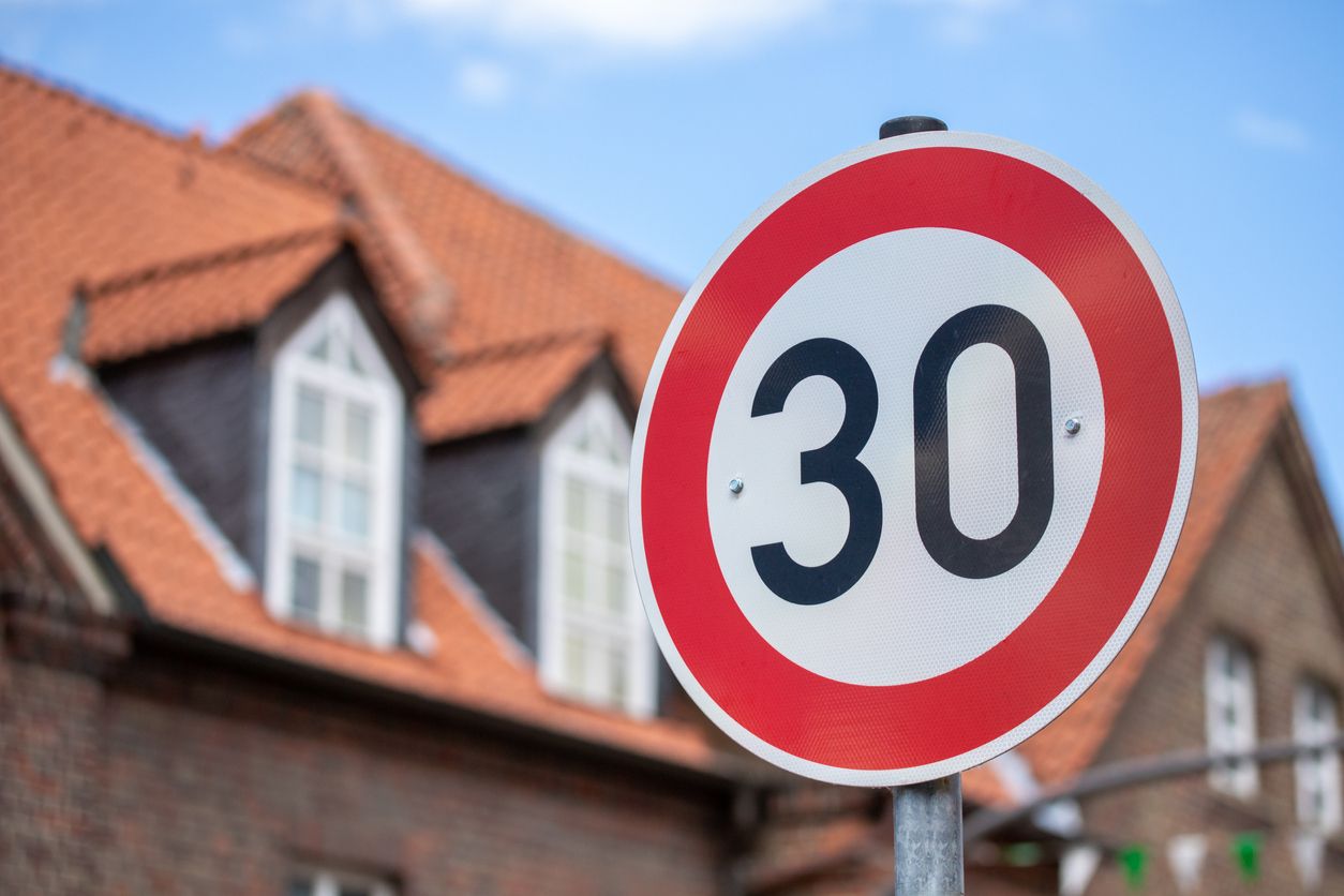 30 km/h speed limit sign on the street