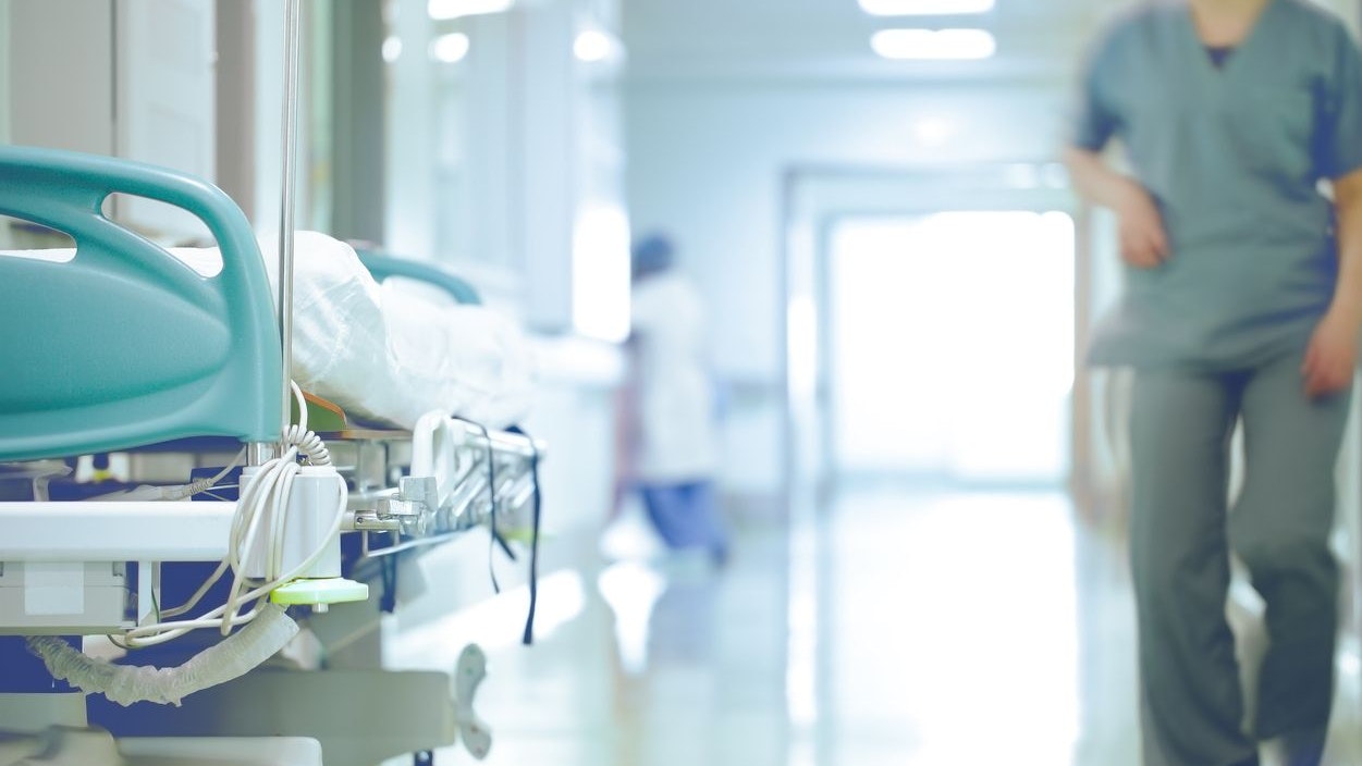 Bed in hallway. The concept of working stressful environment