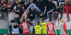 Münzwurf, Platzsturm! ÖFB-Star hält die Fans zurück