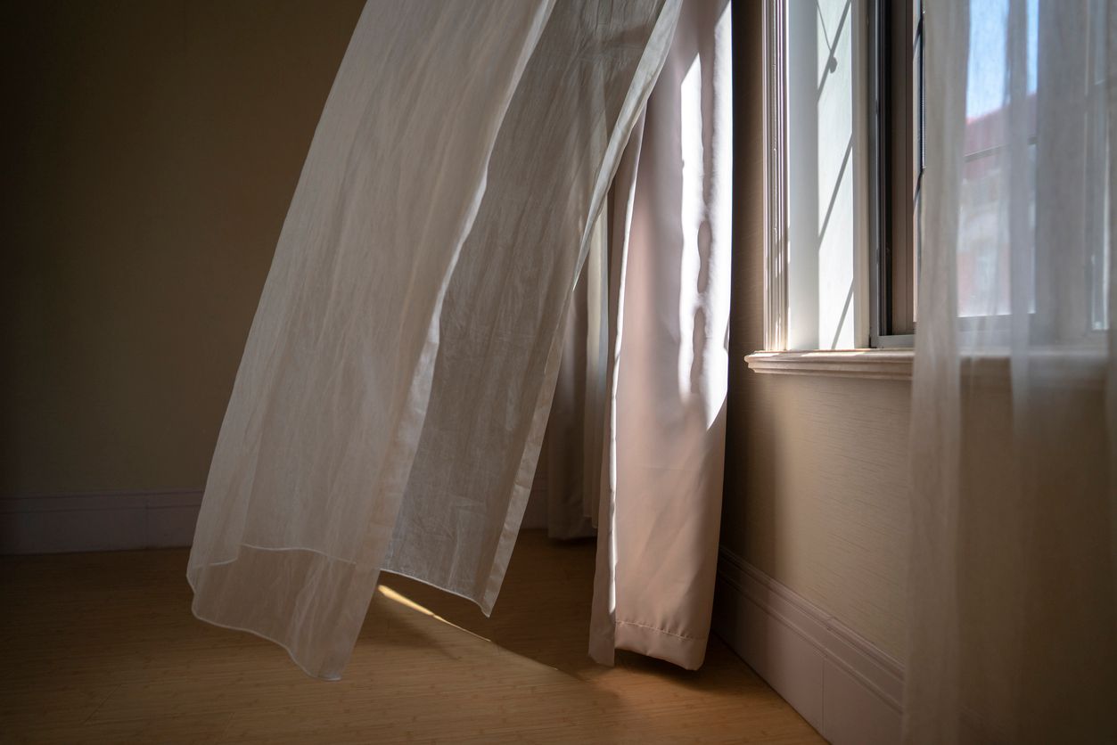window,curtain and sunlight in morning