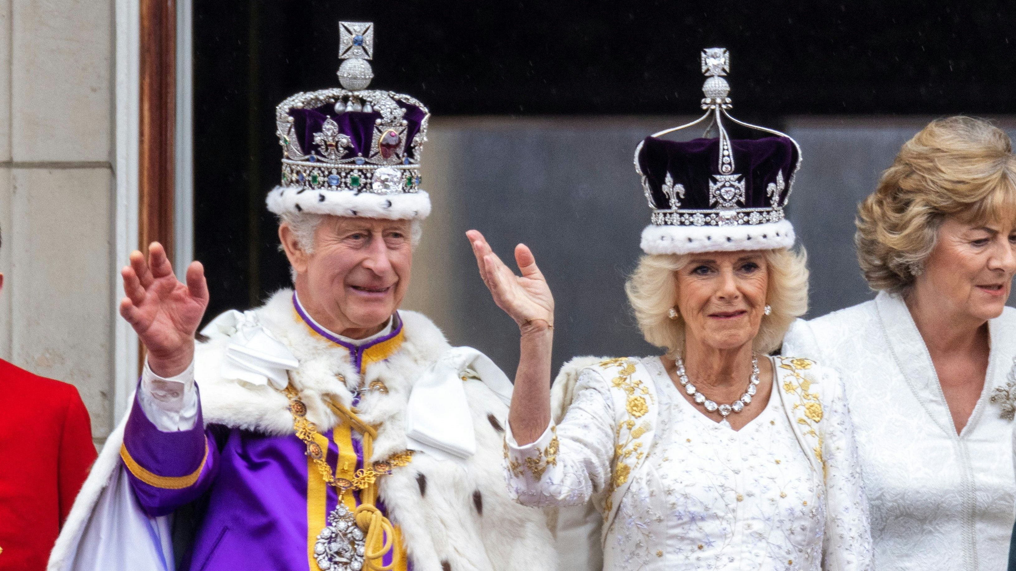 Britain's King Charles and Queen Camilla wave on the Buckingham Palace balcony following the coronation ceremony in London, Britain May 6, 2023. Ian Vogler/Pool via REUTERS