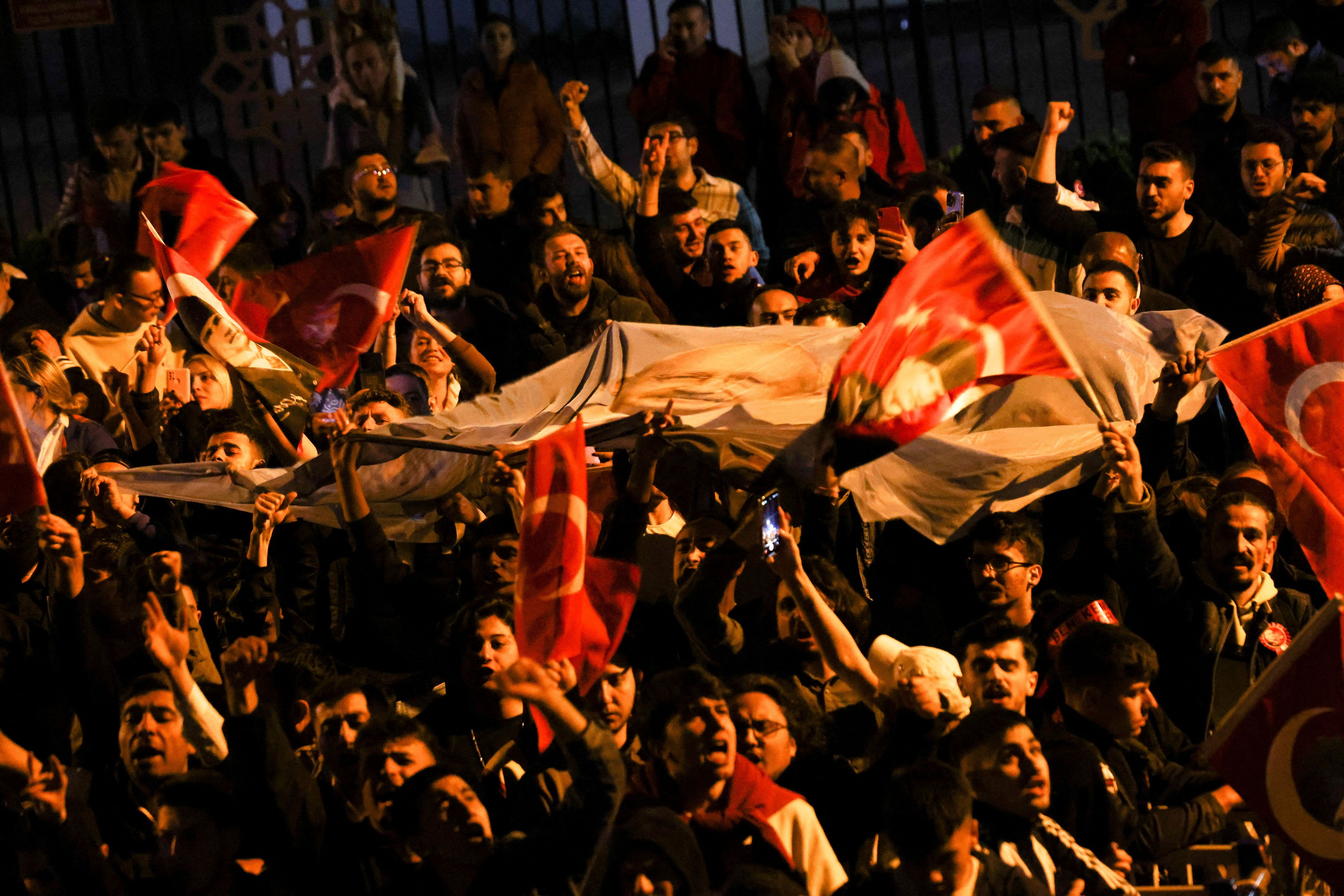 FILE PHOTO: Supporters of Kemal Kilicdaroglu, presidential candidate of Turkey's main opposition alliance, react at the Republican People's Party (CHP) headquarters in Ankara, Turkey May 15, 2023. REUTERS/Cagla Gurdogan/File Photo