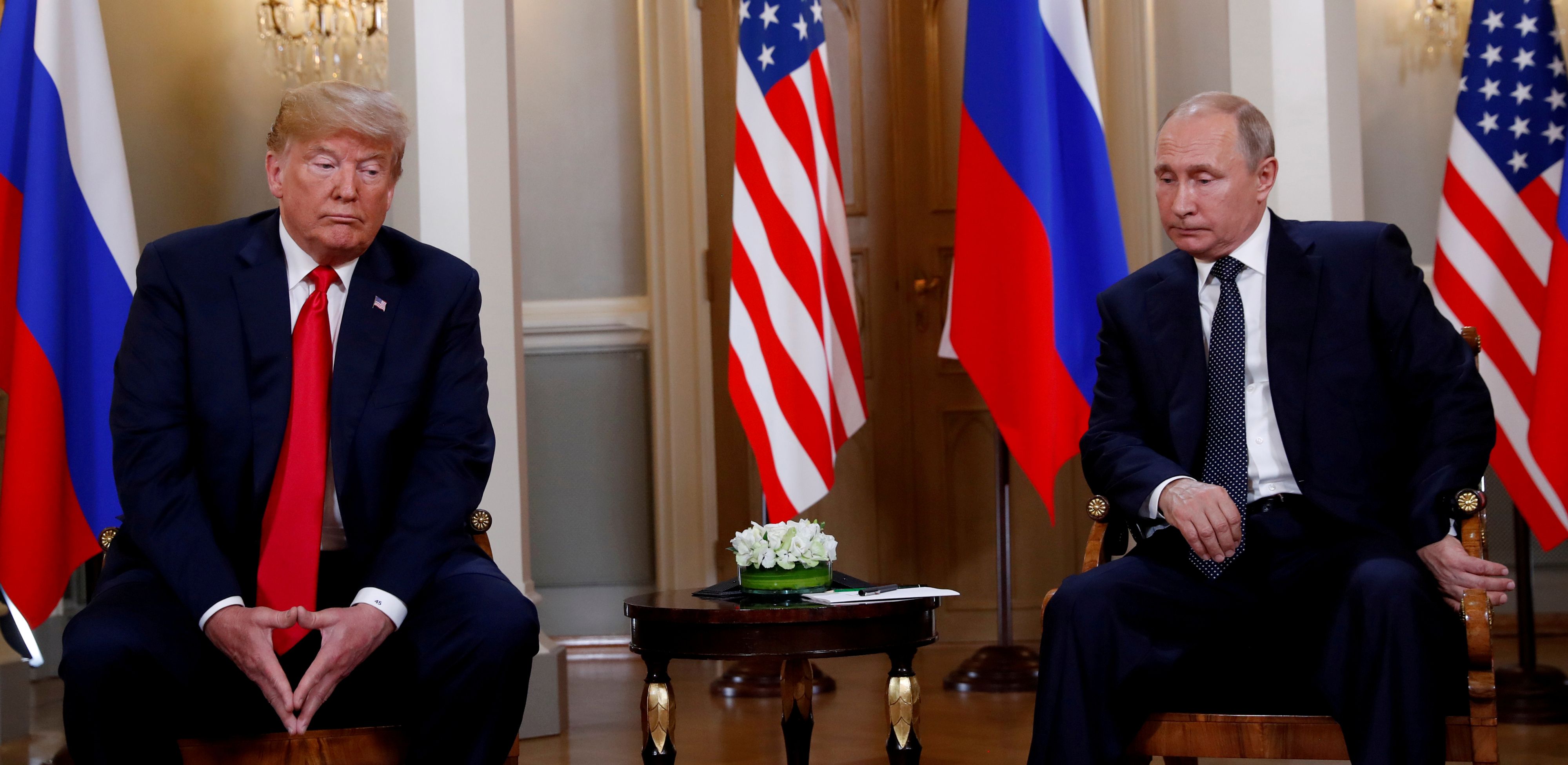 FILE PHOTO: FILE PHOTO: President Donald Trump meets with Russian President Vladimir Putin in Helsinki, Finland, July 16, 2018. REUTERS/Kevin Lamarque/File Photo/File Photo