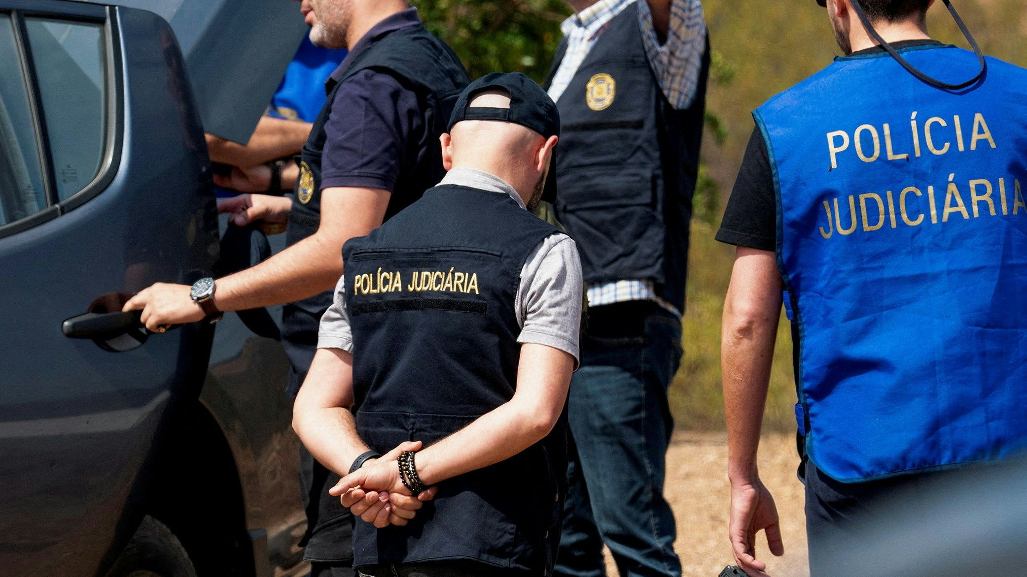 Officers of Portugal's investigative Judicial Police are seen at the site of a remote reservoir where a new search for the body of Madeleine McCann is set to take place, in Silves, Portugal, in this screen grab from a video, May 22, 2023. REUTERS/Luis Ferreira       NO RESALES. NO ARCHIVES.