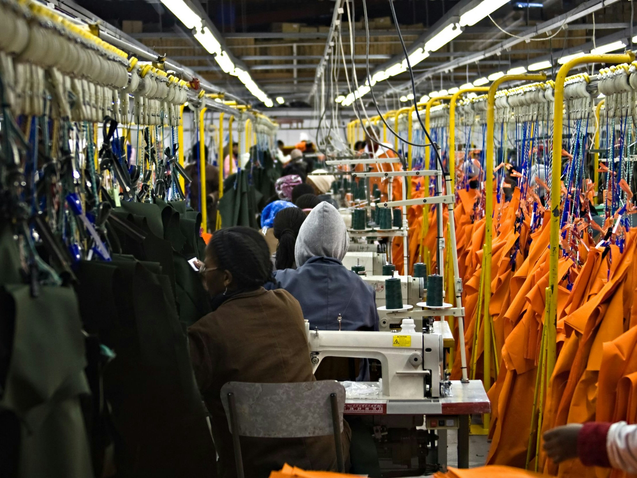 African American woman working in a clothing factory, industrial series