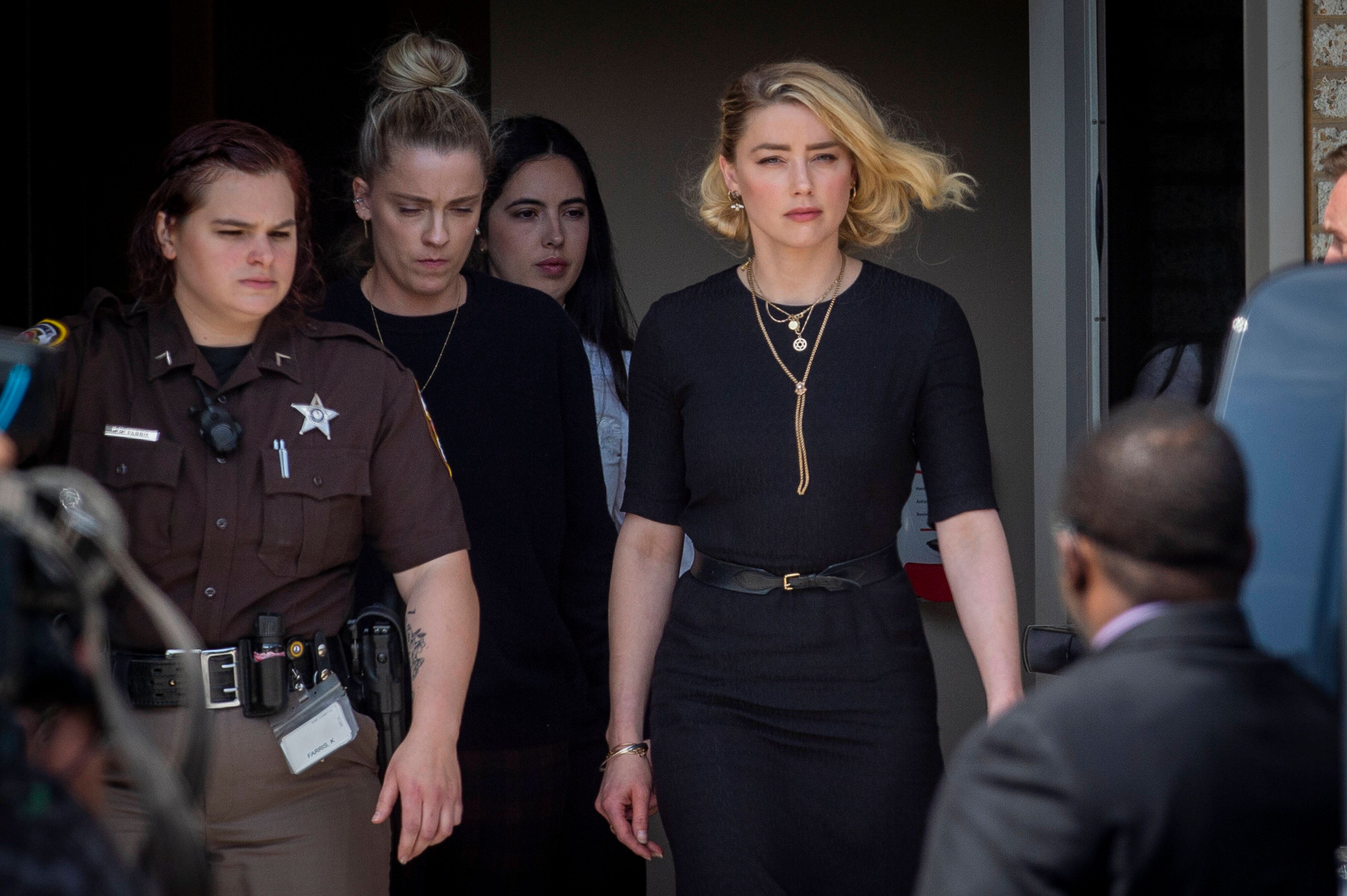 June 1, 2022, Washington, District of Columbia, USA: Actress Amber Heard, right, and her sister Whitney Heard, left, depart the Fairfax County Courthouse following the verdicts in her trial against Johnny Depp in Fairfax, Virginia, Wednesday, June 1, 2022 Washington USA - ZUMAs152 20220601_zaa_s152_006 Copyright: xRodxLamkeyx 