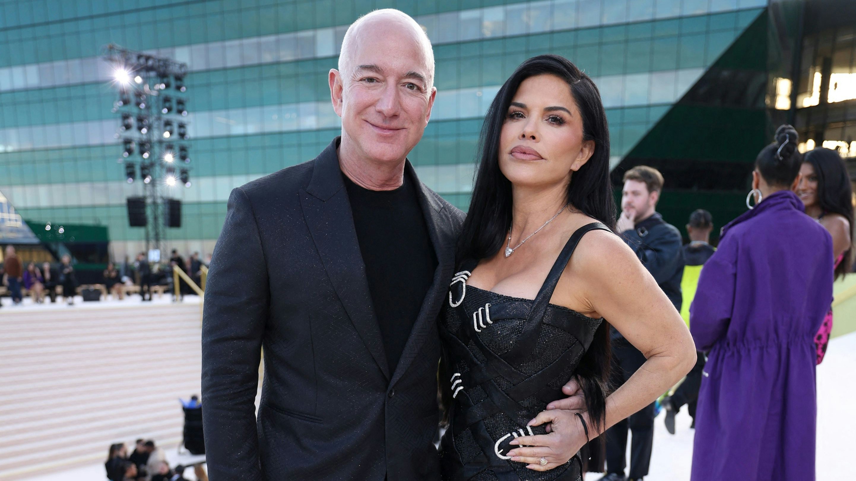 Jeff Bezos and Lauren Sanchez attend the Versace Fall-Winter 2023 collection fashion show in Los Angeles, California, U.S. March 9, 2023. REUTERS/Mario Anzuoni