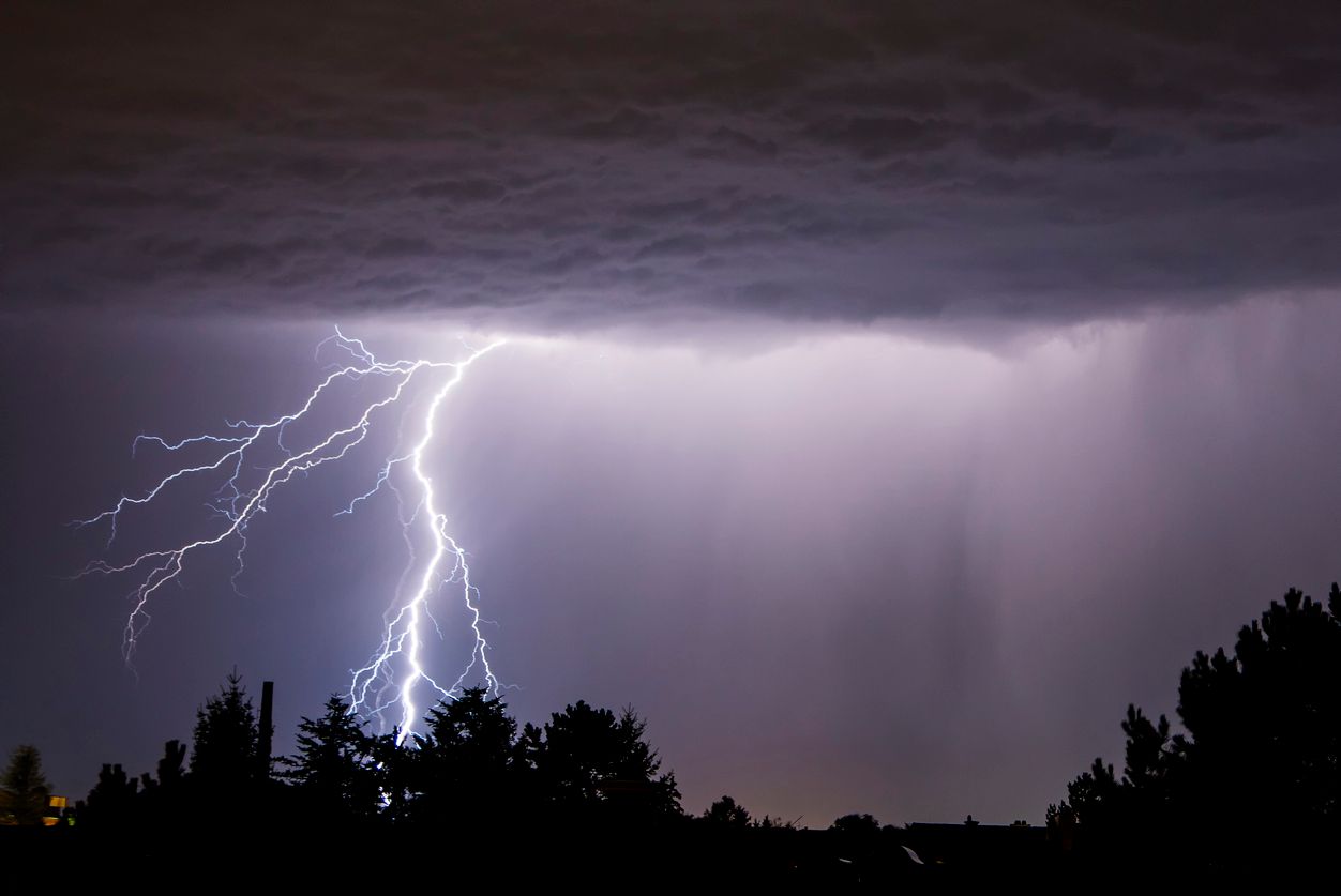 powerful lightning strikes over the night sky