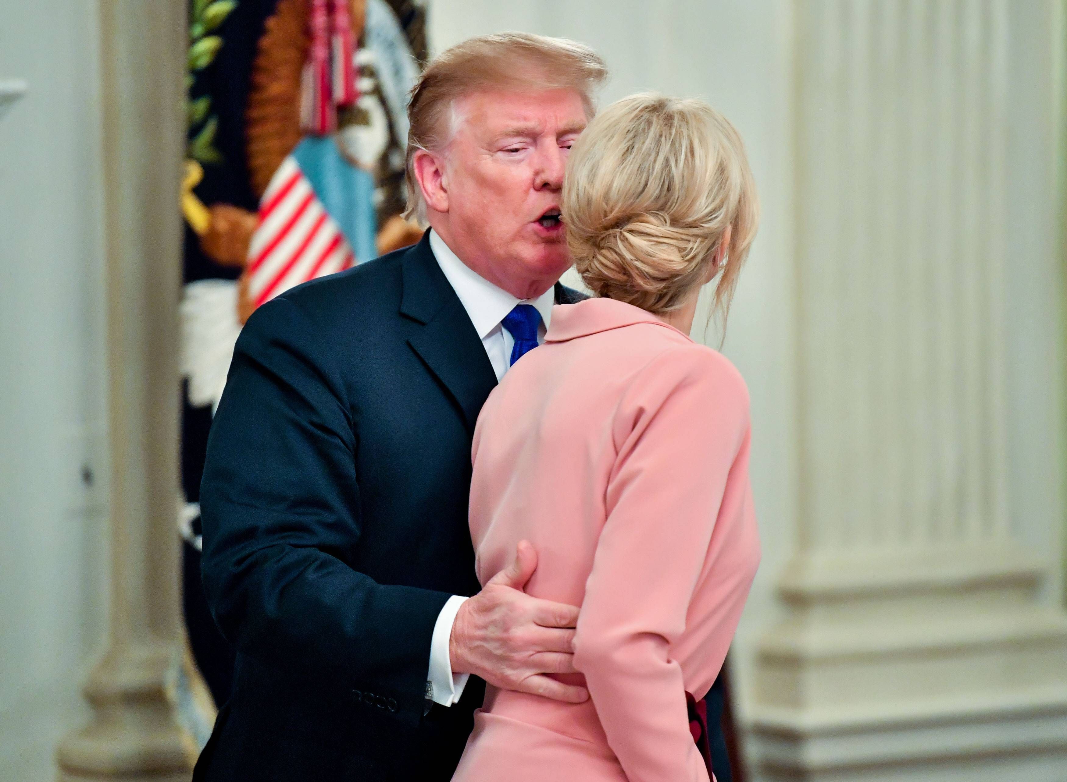 President Donald Trump kisses his daughter Ivanka as he arrives for an American Workforce Policy Advisory Board Meeting at the White House in Washington, D.C. on March 6, 2019. PUBLICATIONxINxGERxSUIxAUTxHUNxONLY WAP20190306337 KEVINxDIETSCH  