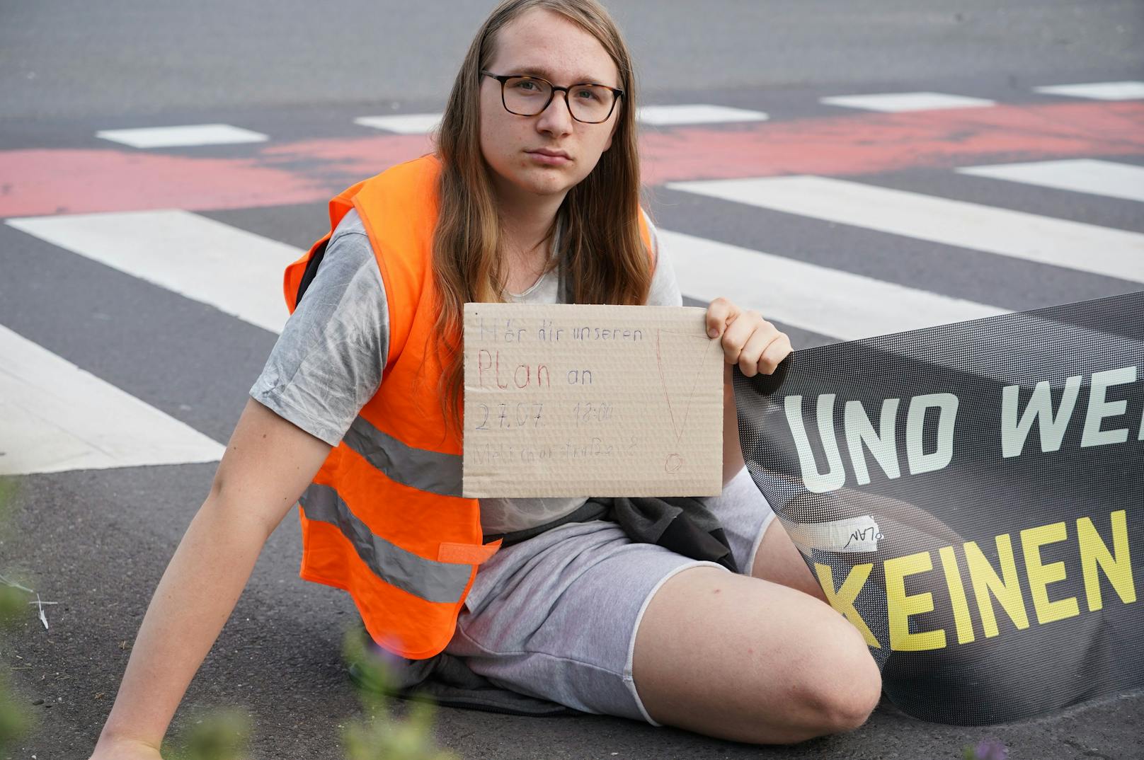 Bilder des Straßenprotests der Letzten Generation in Linz am 24. Juli 2023.