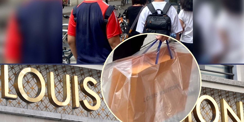 Ein Mann packte seine Einkaufstüte in eine weitere Tüte.