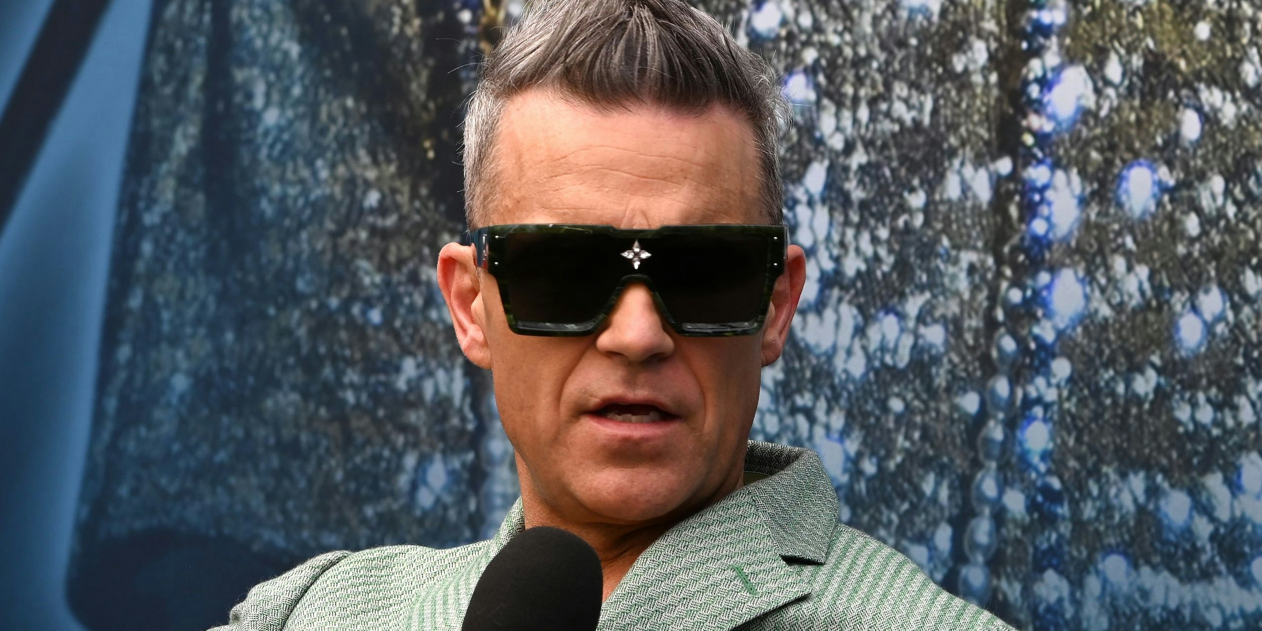 Robbie Williams hat eigene Ansichten zum Umgang mit KI.