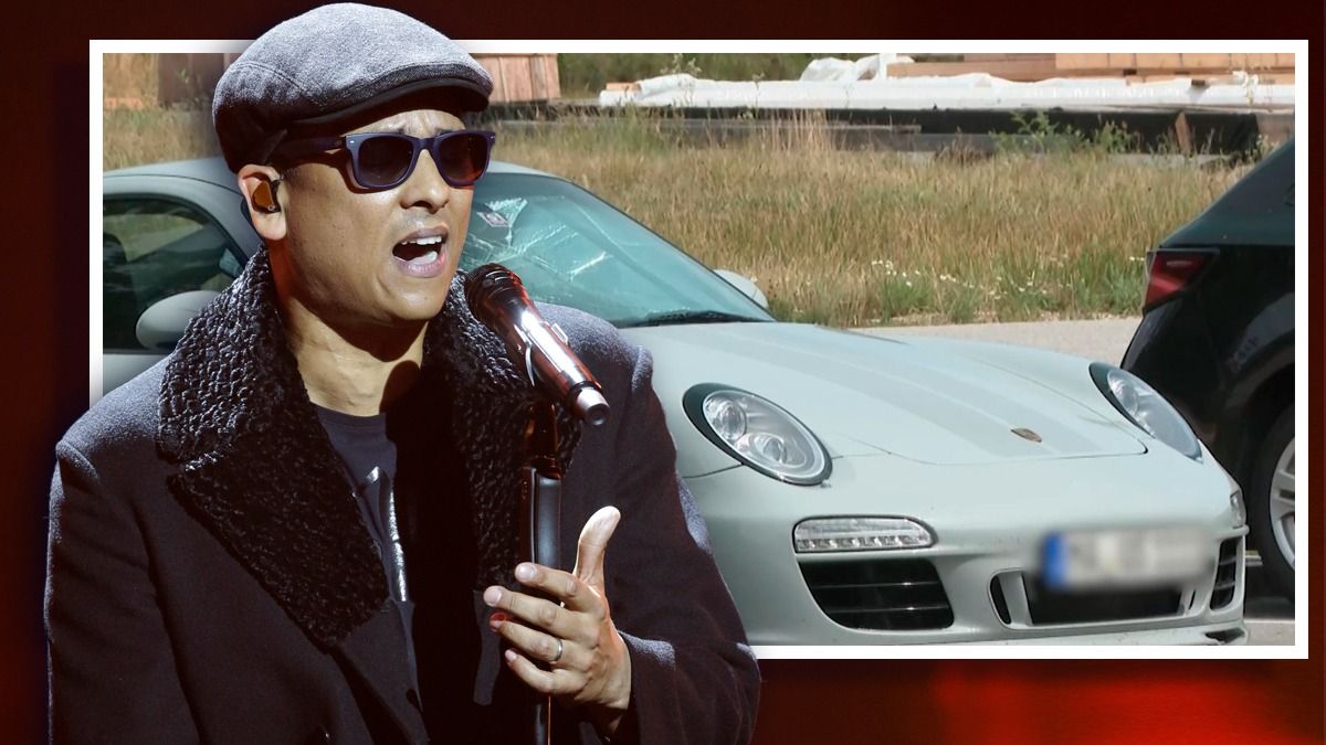 Xavier Naidoo - im Hintergrund der Porsche, mit dem er den Crash in Österreich verursachte.