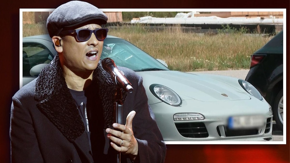 Xavier Naidoo - im Hintergrund der Porsche, mit dem er den Crash in Österreich verursachte.