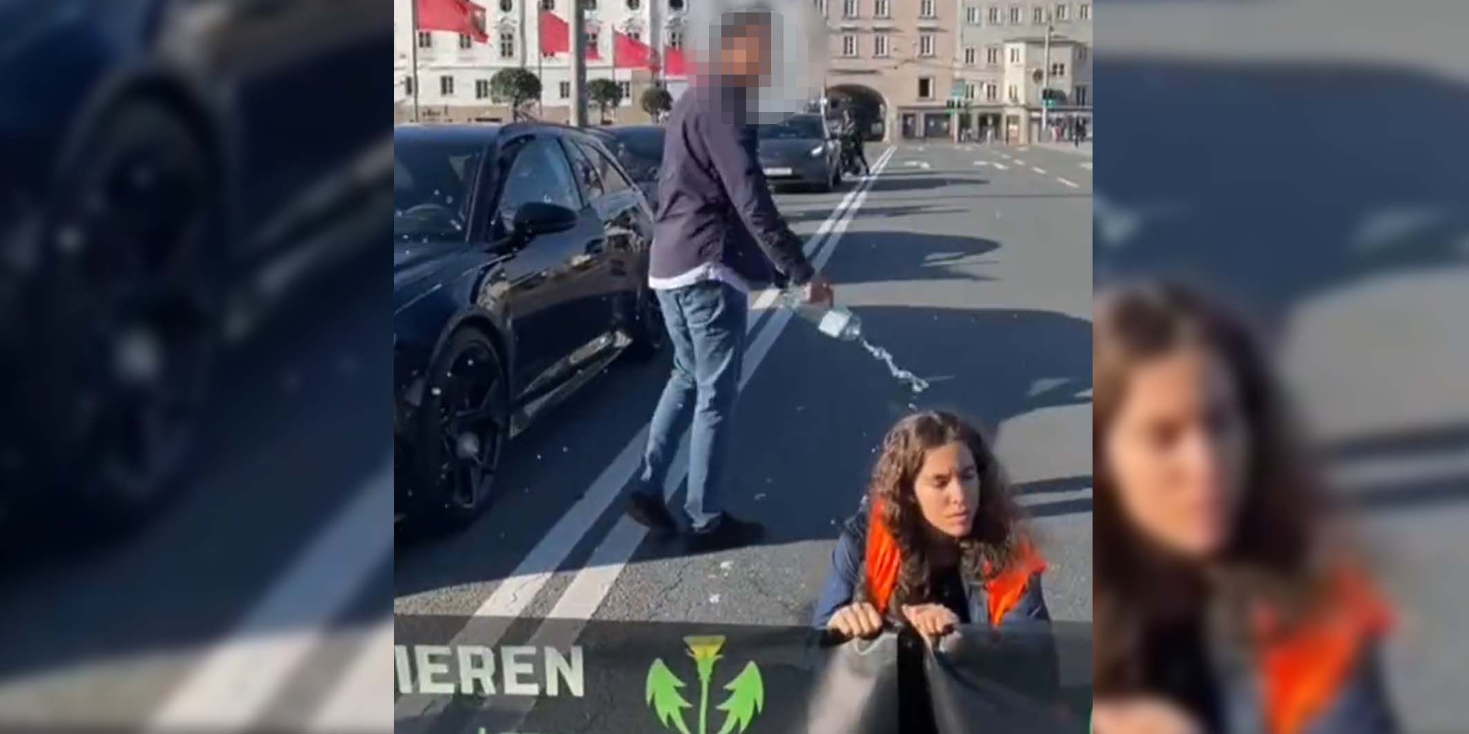 Bei der Klimademo in Salzburg schüttet ein Autolenker Wasser über die Aktivisten.