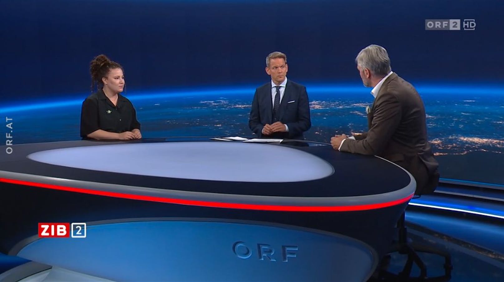 Debatte um Tempo 100: Anna Freund (Letzte Generation) und Bernhard Wiesinger (ÖAMTC) in der ZIB2 mit Martin Thür am 10. August 2023.