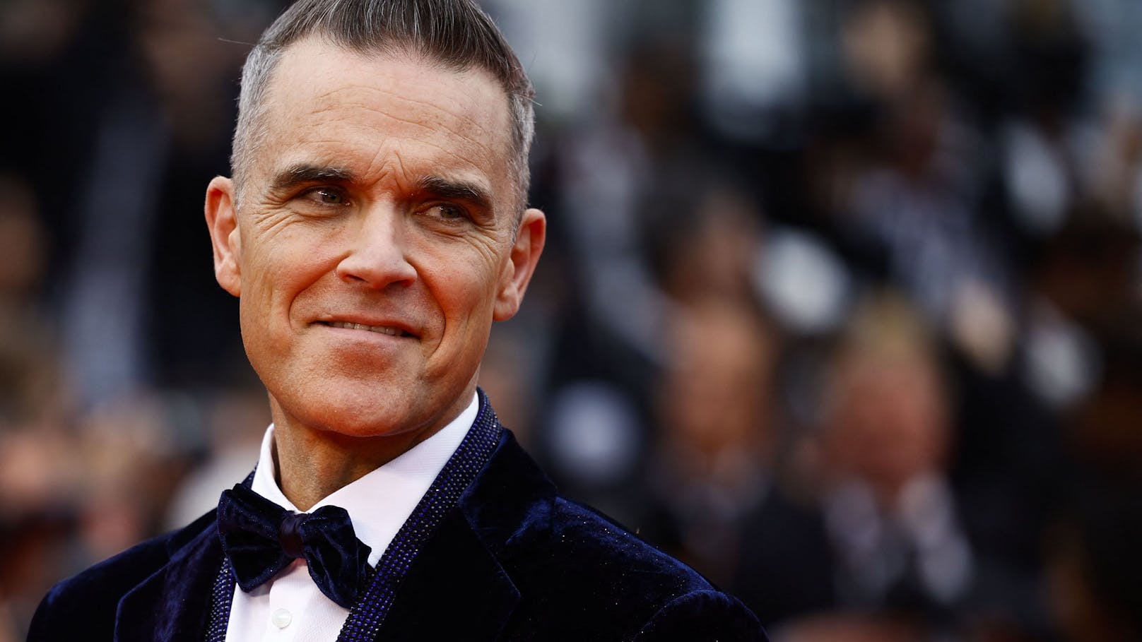 Meet & Greet mit Robbie Williams für den guten Zweck