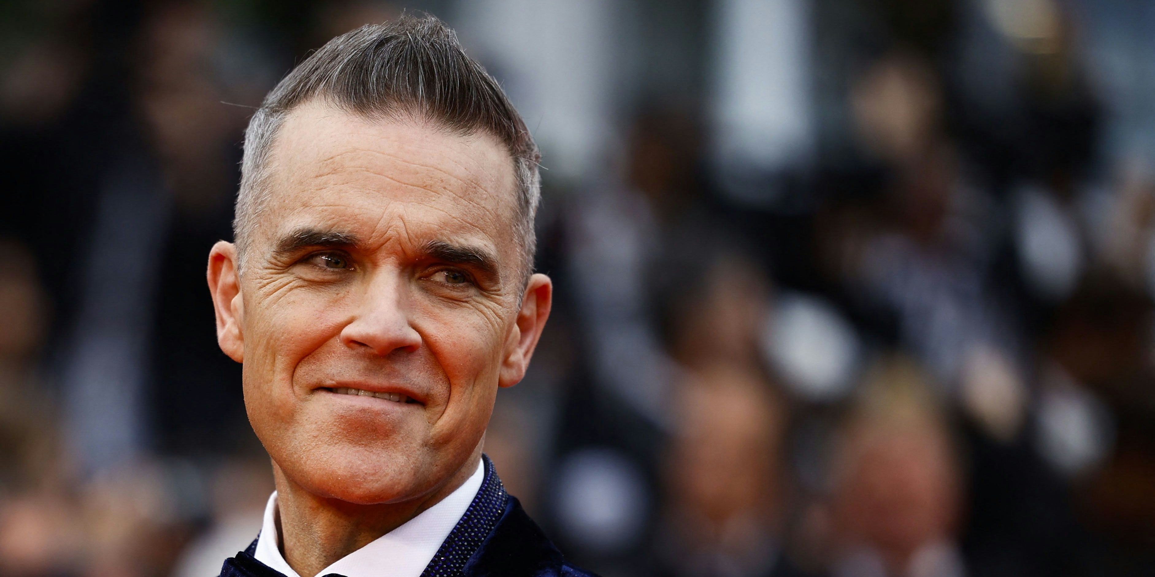 The 76th Cannes Film Festival - Screening of the film "Killers of the Flower Moon" Out of Competition - Red Carpet Arrivals - Cannes, France, May 20,  2023. Robbie Williams poses. REUTERS/Sarah Meyssonnier