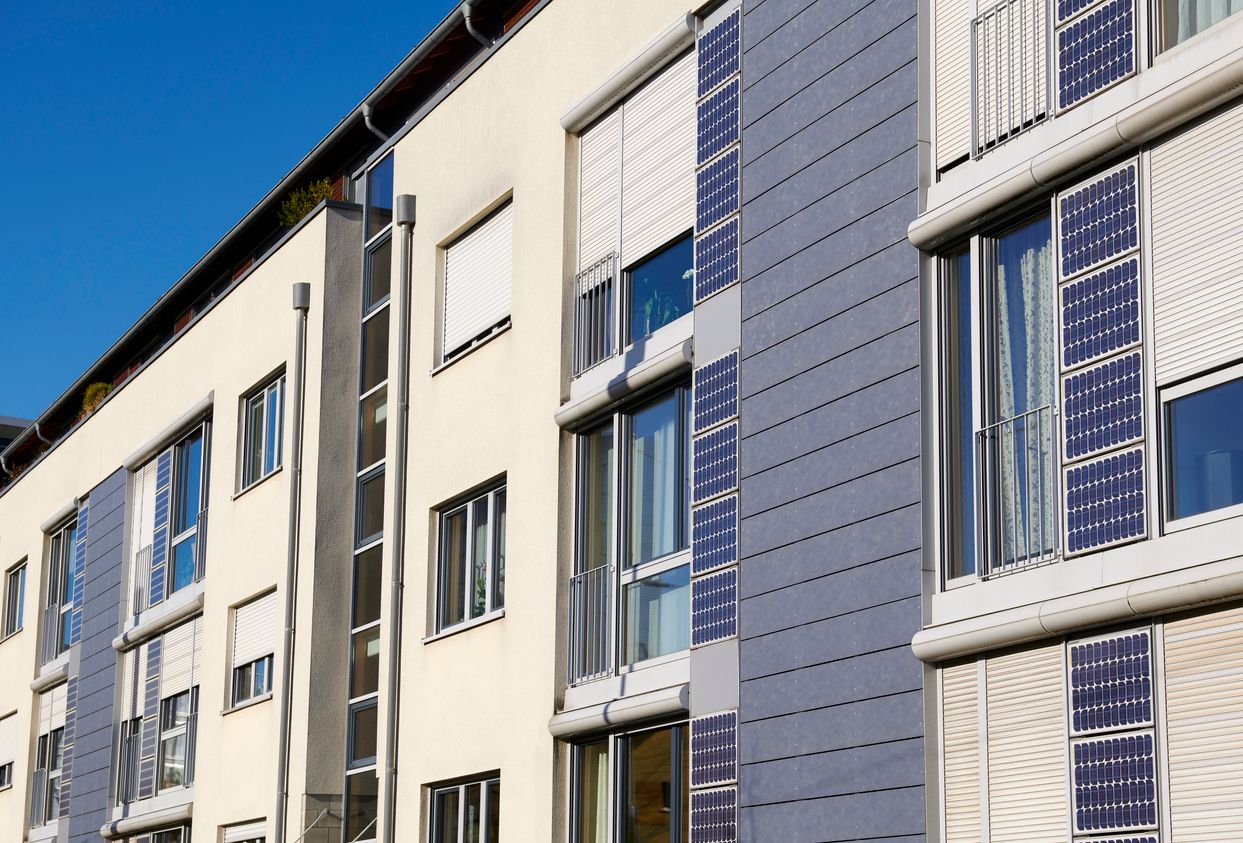 Solar panels at the facades of basic apartment buildings.