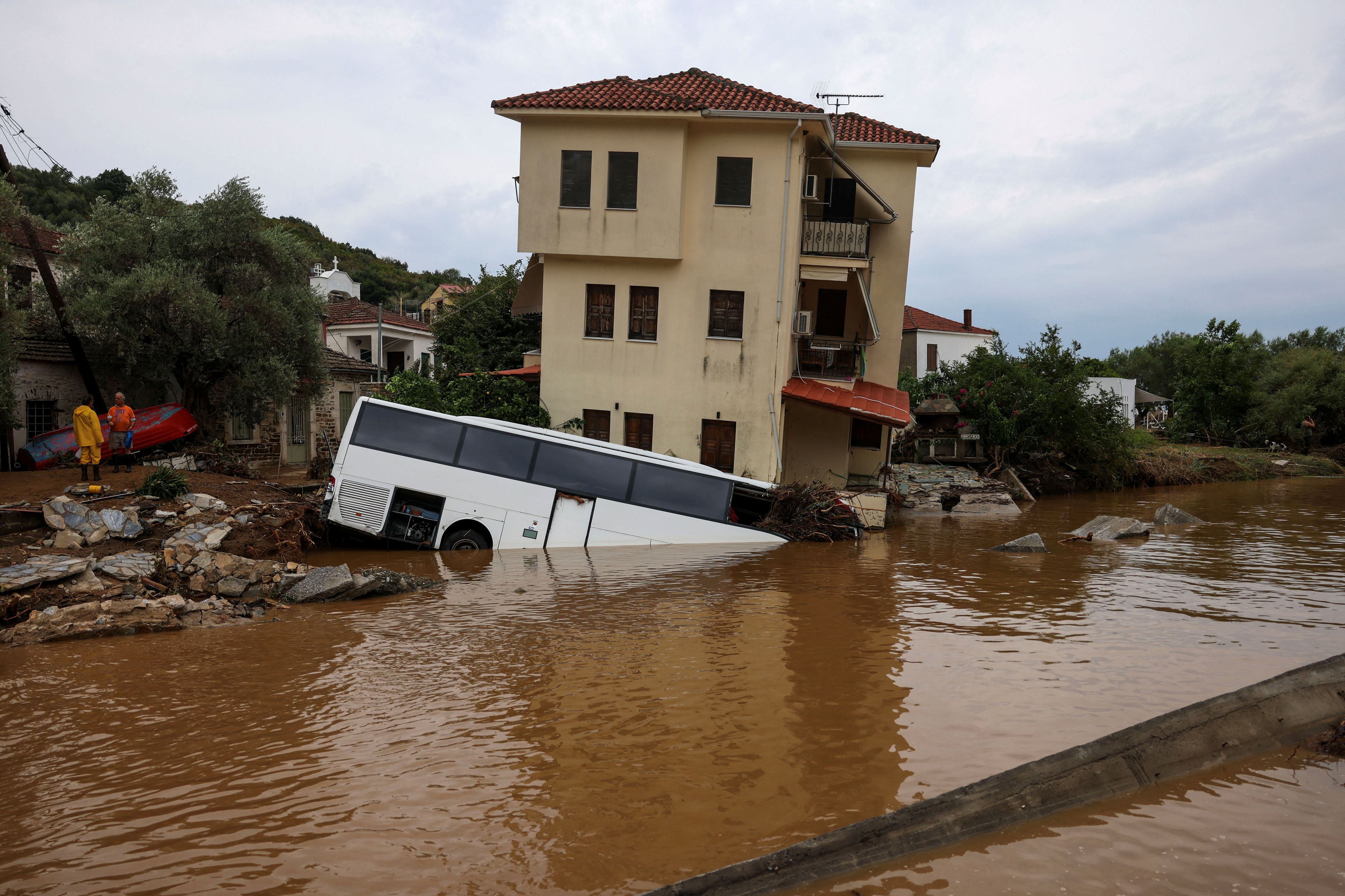 A bus is partially submerged following flash floods, as storm Daniel hits central Greece, in the village of Platanias, Greece, September 6, 2023. REUTERS/Alexandros Avramidis