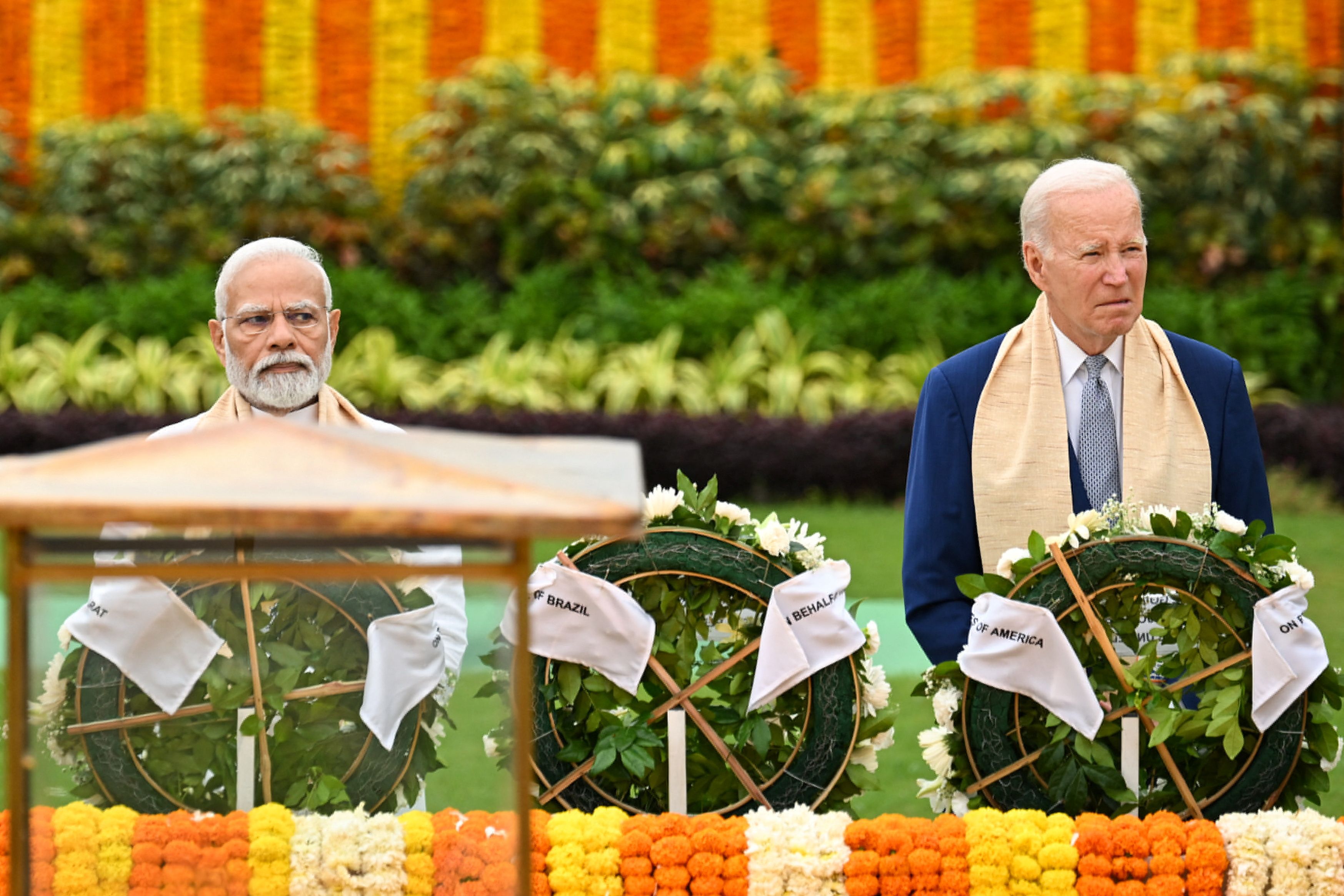 U.S. President Joe Biden visits Raj Ghat memorial with Prime Minister of India Narendra Modi and other G20 leaders, Sept. 10, 2023, in New Delhi.     Kenny Holston/Pool via REUTERS