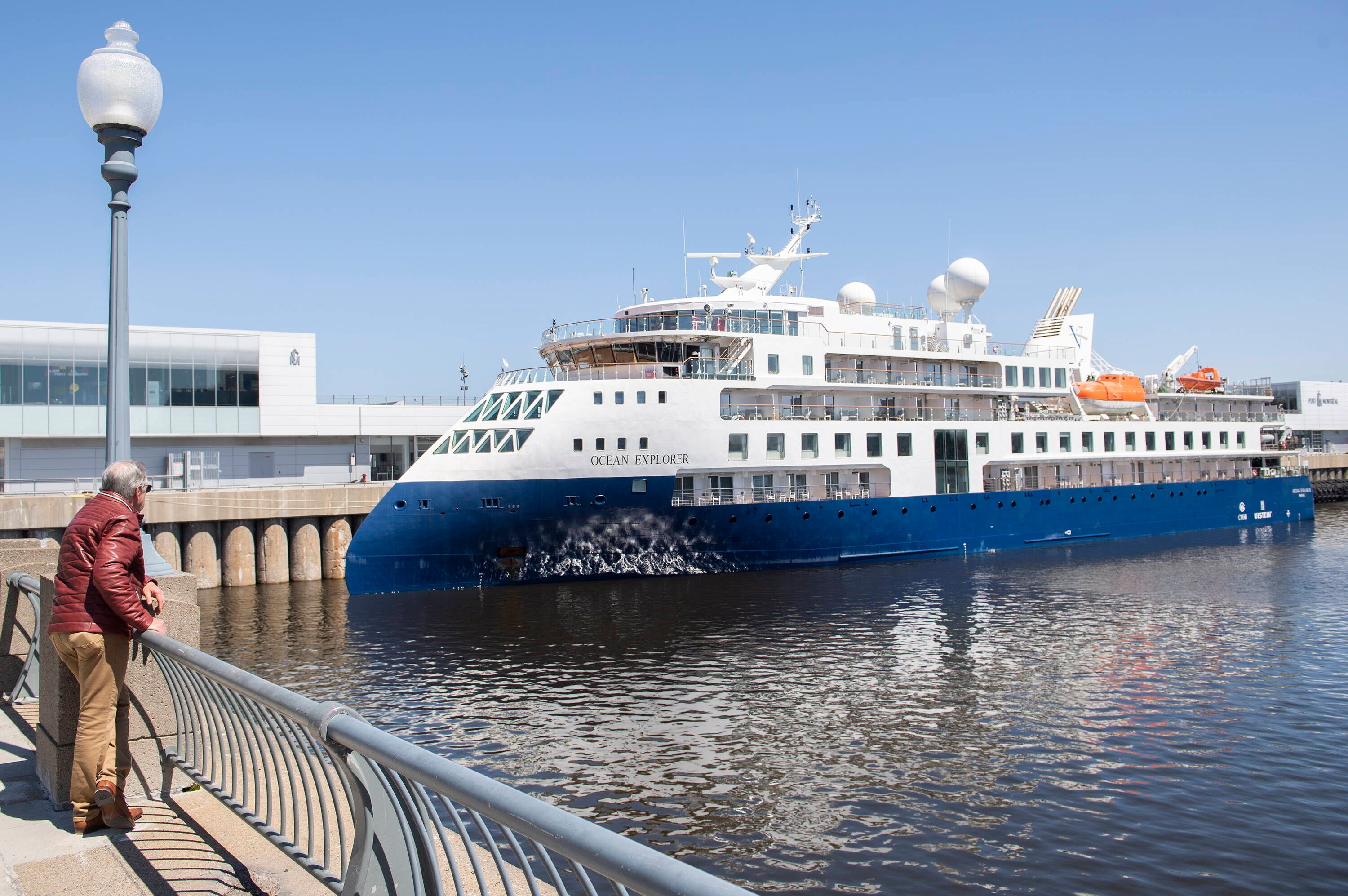 May 8, 2022, Montreal, PQ, Canada: A man looks out at the Ocean Explorer cruise ship in the Port of Montreal, Sunday, May 8, 2022. The Explorer is the second cruise ship to arrive in the port since the pandemic and the city is expecting about 45 cruise ship visits which could bring thousands of passengers to Montreal. Montreal Canada PUBLICATIONxINxGERxSUIxAUTxONLY - ZUMAc35_ 20220508_zaf_c35_004 Copyright: xGrahamxHughesx 