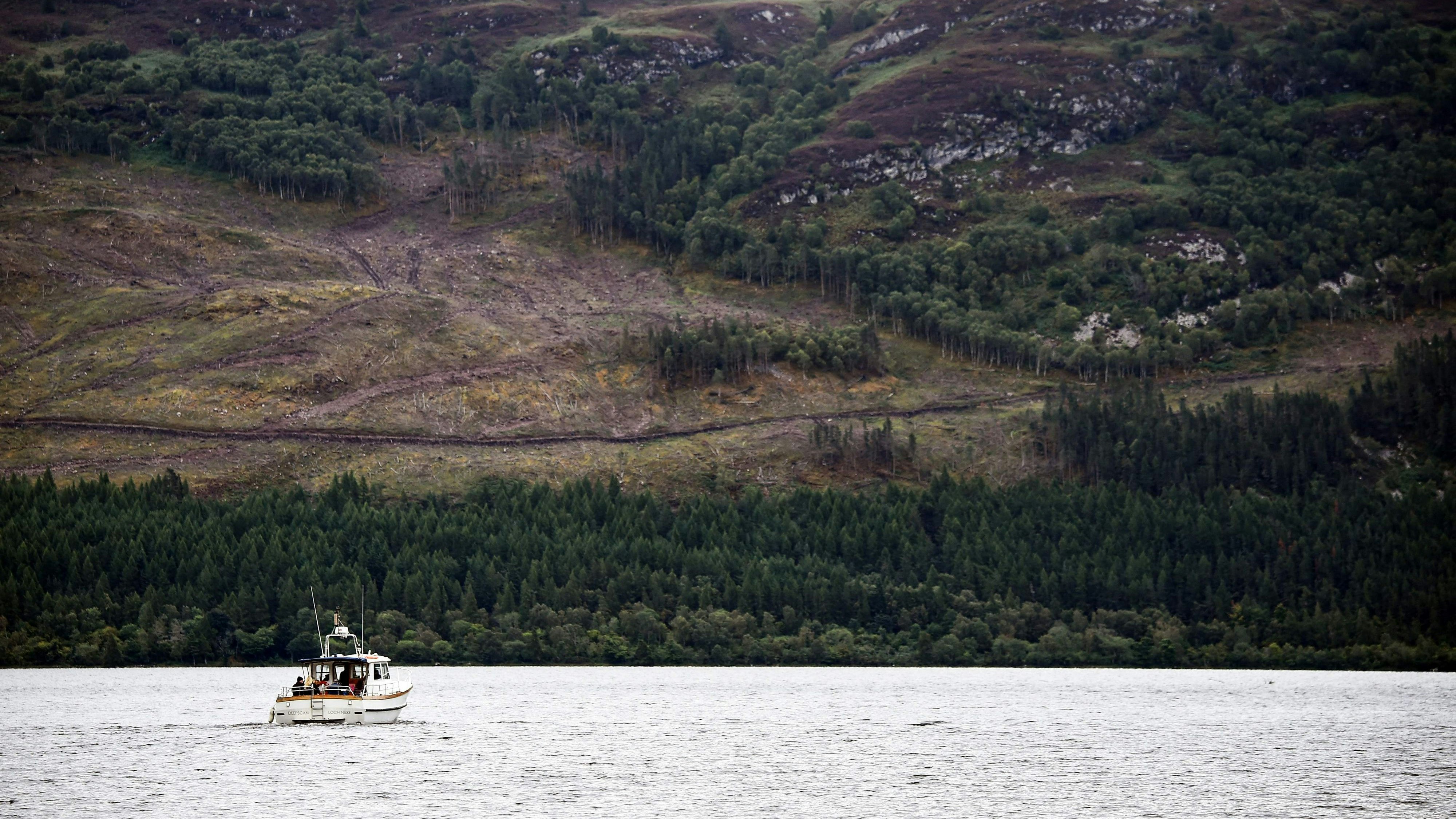 Download von www.picturedesk.com am 13.09.2023 (14:43).  Loch Ness Research Project vessel 'Deepscan' takes monster hunters on a search trip on Loch Ness in the hope of spotting the elusive monster Nessie in Scotland on August 27, 2023. The biggest search for the Loch Ness Monster in five decades got underway in the Scottish Highlands, as researchers and enthusiasts from around the world braved pelting rain to try to track down the elusive Nessie. The expedition deployed drones with thermal scanners, boats with infrared cameras and an underwater hydrophone to try to unravel a mystery that has captivated the world for generations. (Photo by Andy Buchanan / AFP) - 20230827_PD3200 - Rechteinfo: Rights Managed (RM) Nur für redaktionelle Nutzung! Werbliche Nutzung erfordert Freigabe: bitte schicken Sie uns eine Anfrage.