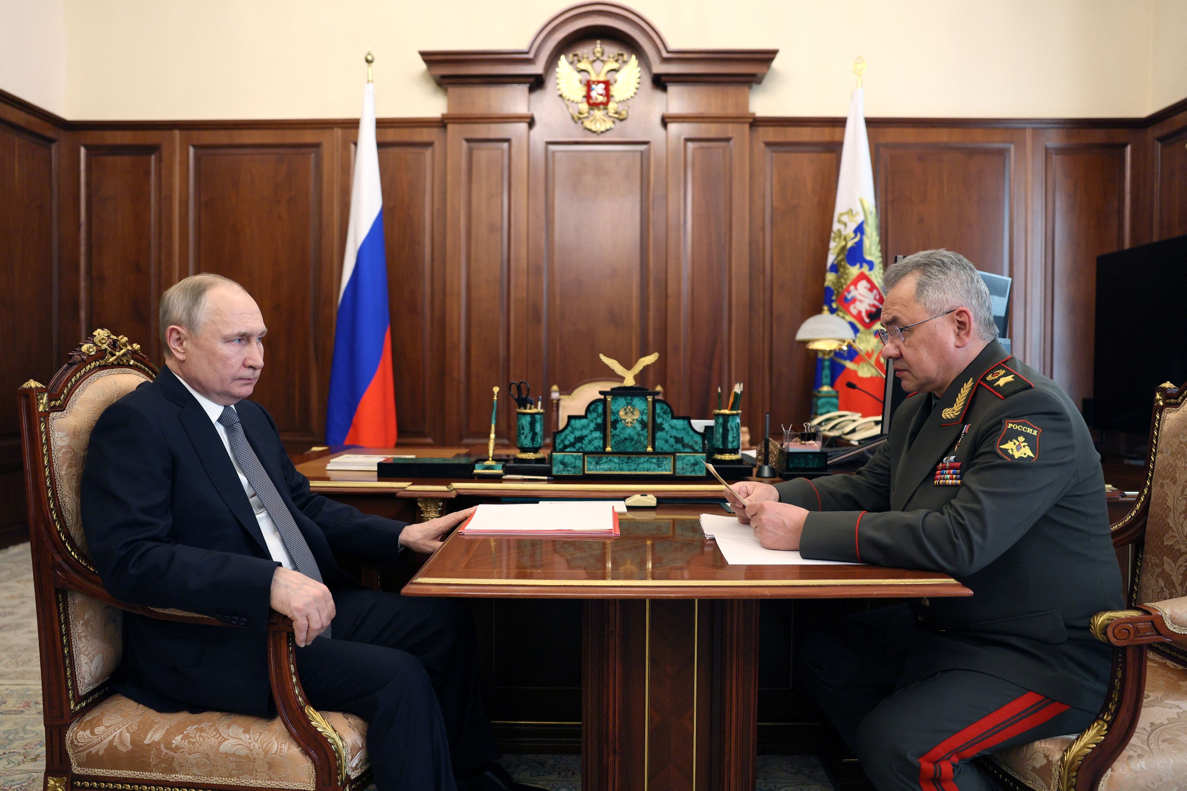 Russian President Vladimir Putin attends a meeting with Defence Minister Sergei Shoigu in Moscow, Russia, April 17, 2023. Sputnik/Gavriil Grigorov/Kremlin via REUTERS ATTENTION EDITORS - THIS IMAGE WAS PROVIDED BY A THIRD PARTY.