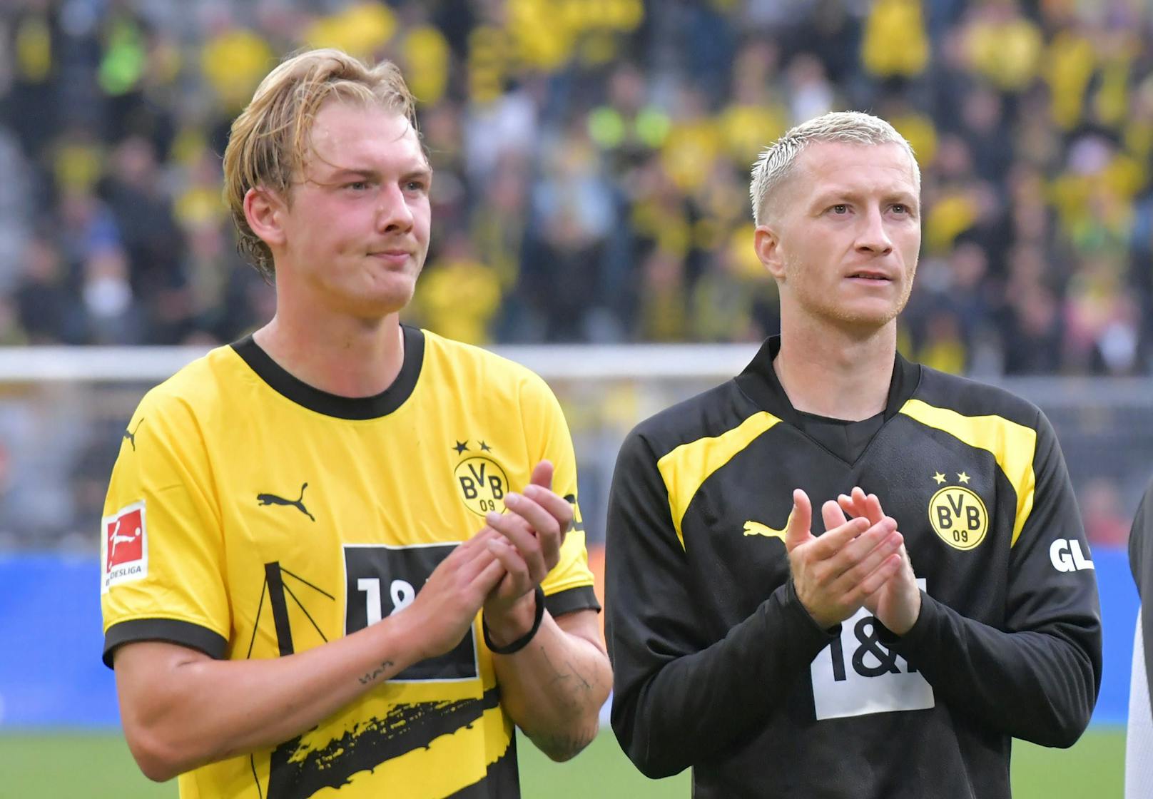 Julian Brandt mit Kapitän Marco Reus