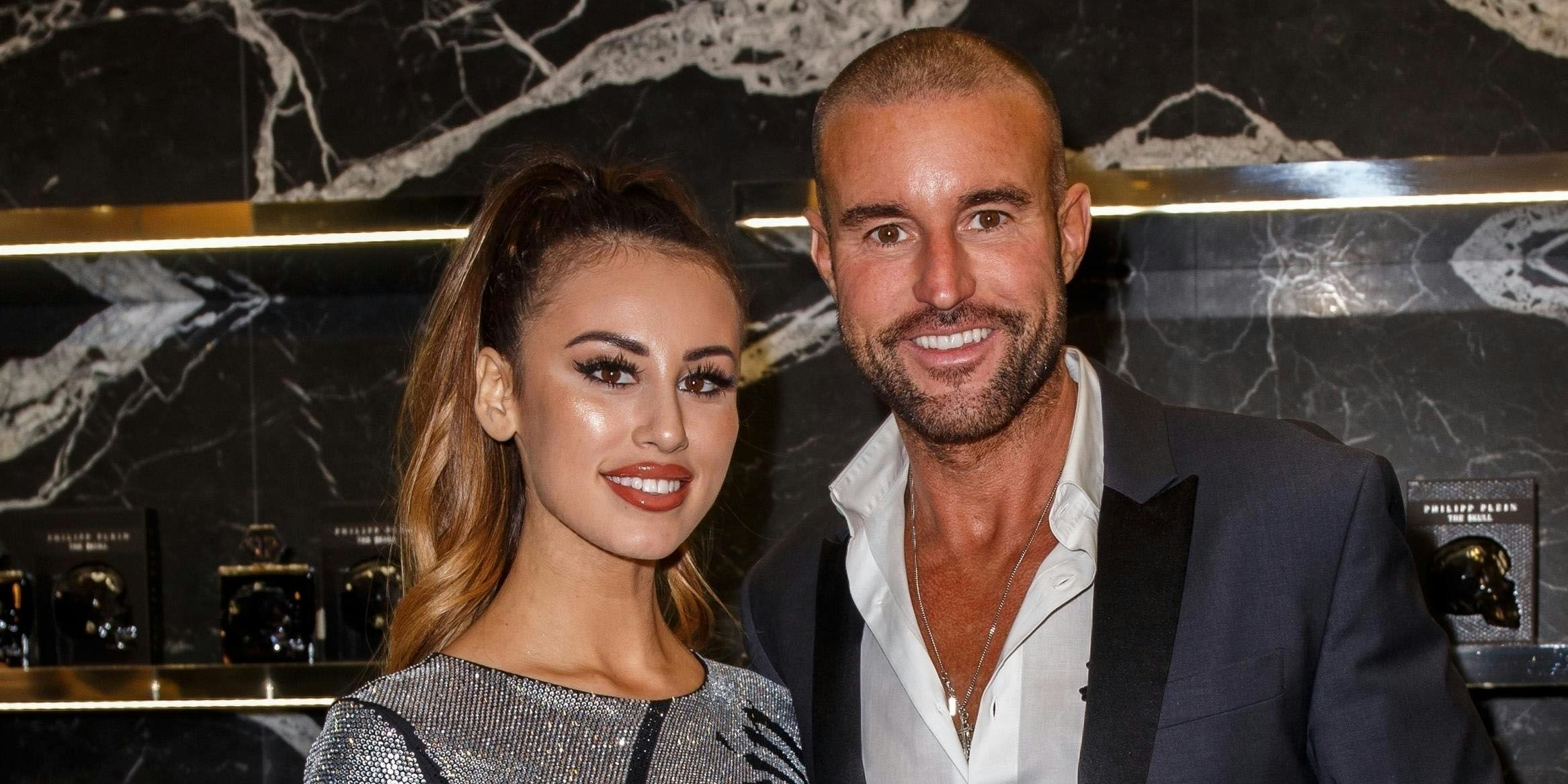 BGUK_1812960 - Berlin, GERMANY  - German fashion Designer Philipp Plein presents his new fragrance 'The Skull'  at his flagship store in Berlin.  Pictured: Lucia Bartoli, Philipp Plein     --> @ Photo Press Service - Austria - 1170 Vienna - phone: +43(1)4843030 - photo@pps.at By publishing this material, the user expressly agrees to indemnify and to hold Photo Press Service harmless from any claims, demands, or causes of action arising out of or connected in any way with user's publication of the material especially written by the Austrian law of ß 78 UrhG.