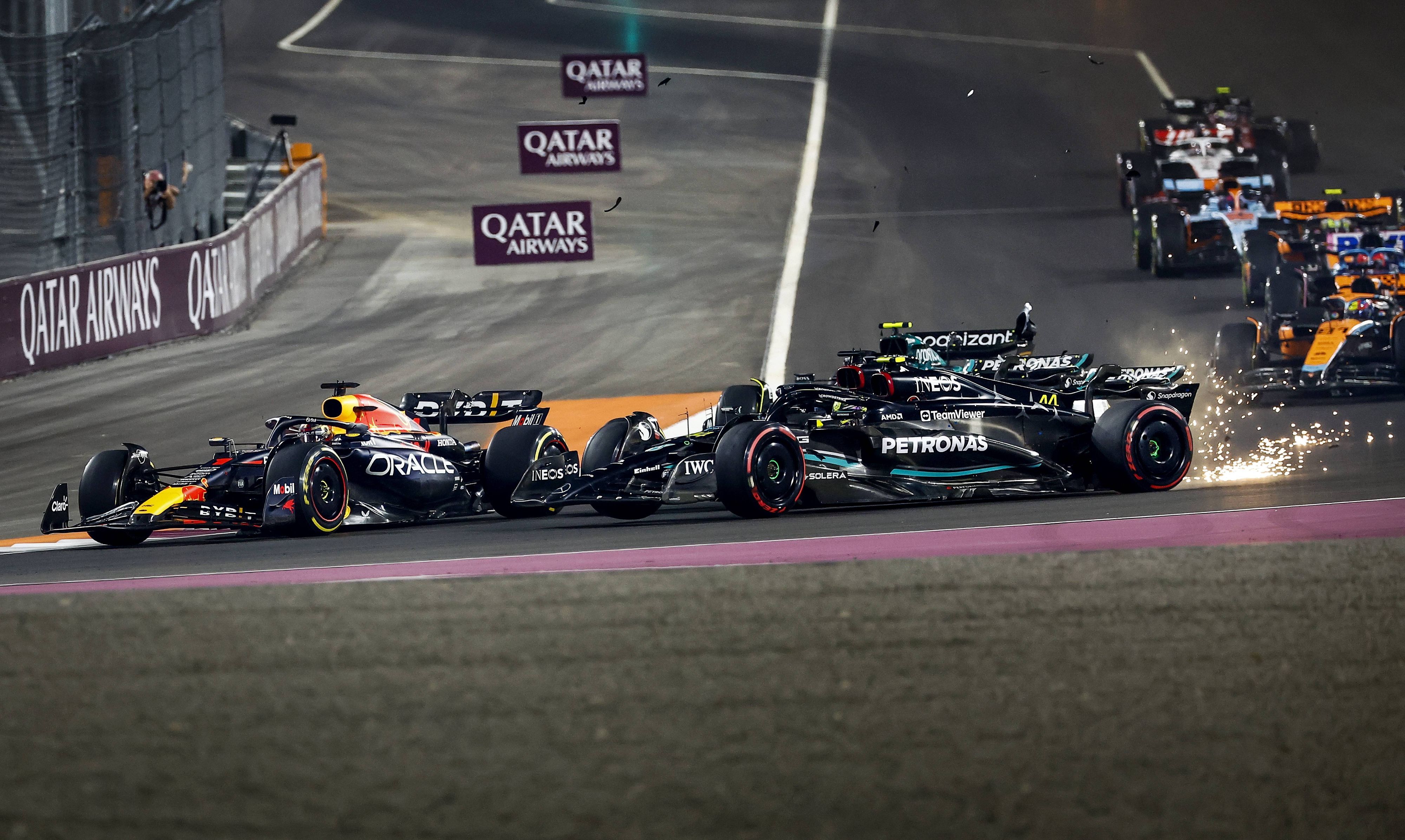 QATAR - Max Verstappen Red Bull Racing in action for George Russell Mercedes and Lewis Hamilton Mercedes during the Formula 1 Grand Prix race at the Lusail International Circuit in Qatar. Max Verstappen became world champion a day earlier during the sprint race. ANP SEM VAN DER WAL Race 2023/2024 xVIxANPxSportx/xxANPxIVx 480601304 originalFilename: 480601304.jpg