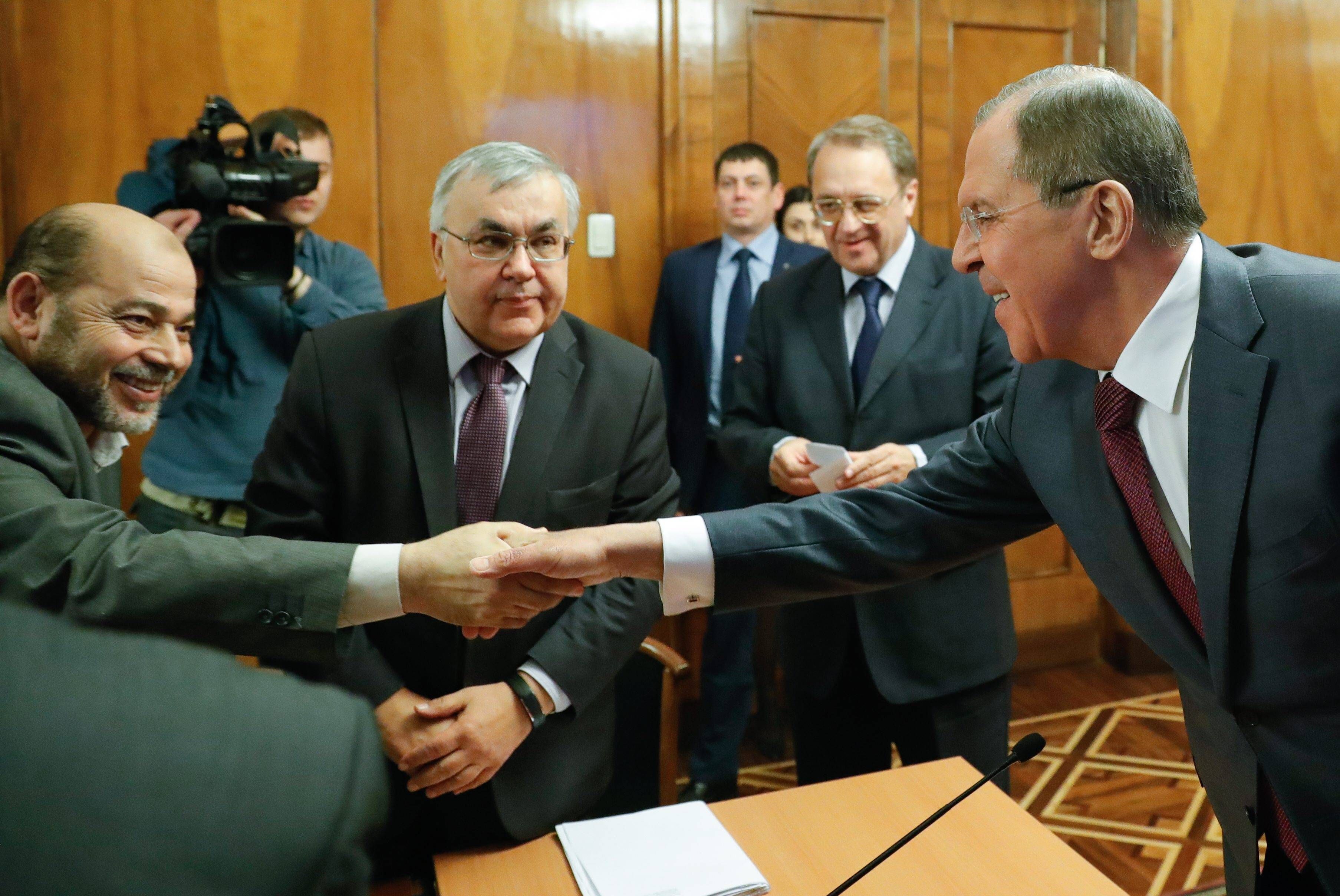 MOSCOW, RUSSIA - JANUARY 16, 2017: Vice president of the Hamas movement s political bureau Mousa Abu Marzook (L), and Russia s minister of foreign affairs Sergei Lavrov (R), shake hands as director of the Middle East and North Africa Department of the Russian Ministry of Foreign Affairs Sergei Vershinin (C front) looks on during a meeting between representatives of Palestinian political parties and top Russian diplomats. Mikhail Japaridze/TASS PUBLICATIONxINxGERxAUTxONLY TS03E138  Moscow Russia January 16 2017 Vice President of The Hamas Movement S Political Bureau Mousa Abu  l and Russia S Ministers of Foreign Affairs Sergei Lavrov r Shake Hands As Director of The Middle East and North Africa Department of The Russian Ministry of Foreign Affairs Sergei Vershinin C Front Looks ON during a Meeting between Representatives of PALESTINIAN Political Parties and Top Russian Diplomats Mikhail Japaridze TASS PUBLICATIONxINxGERxAUTxONLY TS03E138  
