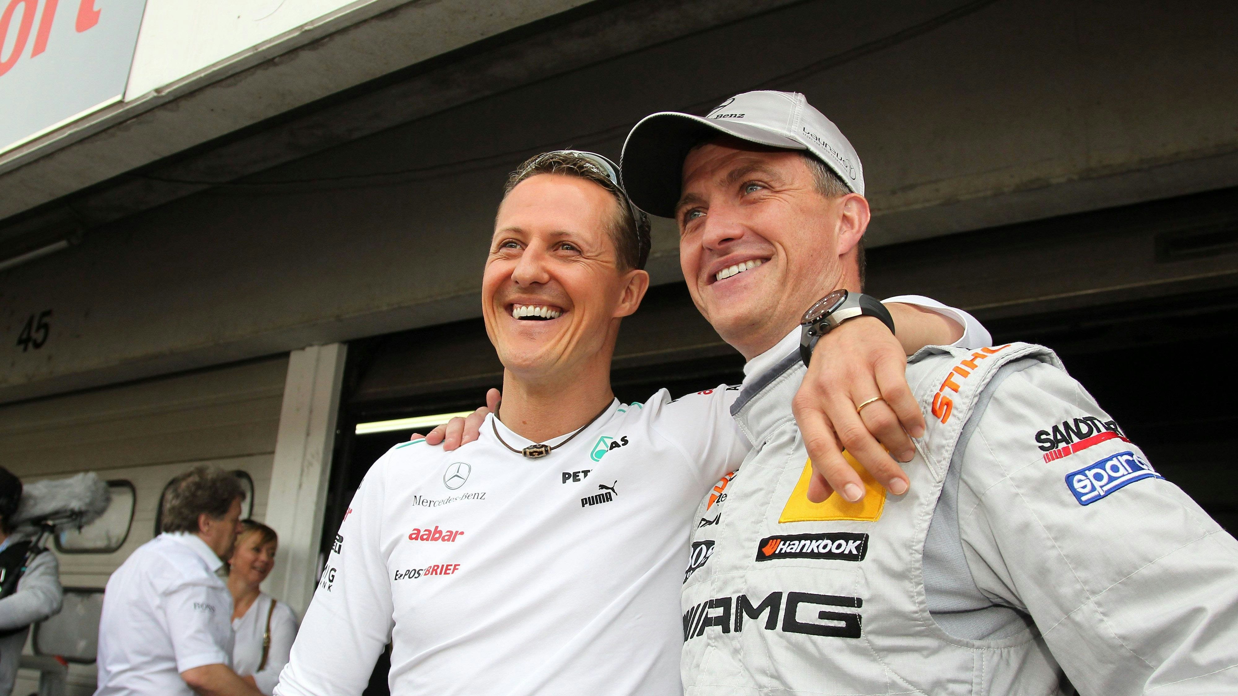 Michael und Ralf Schumacher 2012 bei einem DTM-Rennen in Hockenheim.