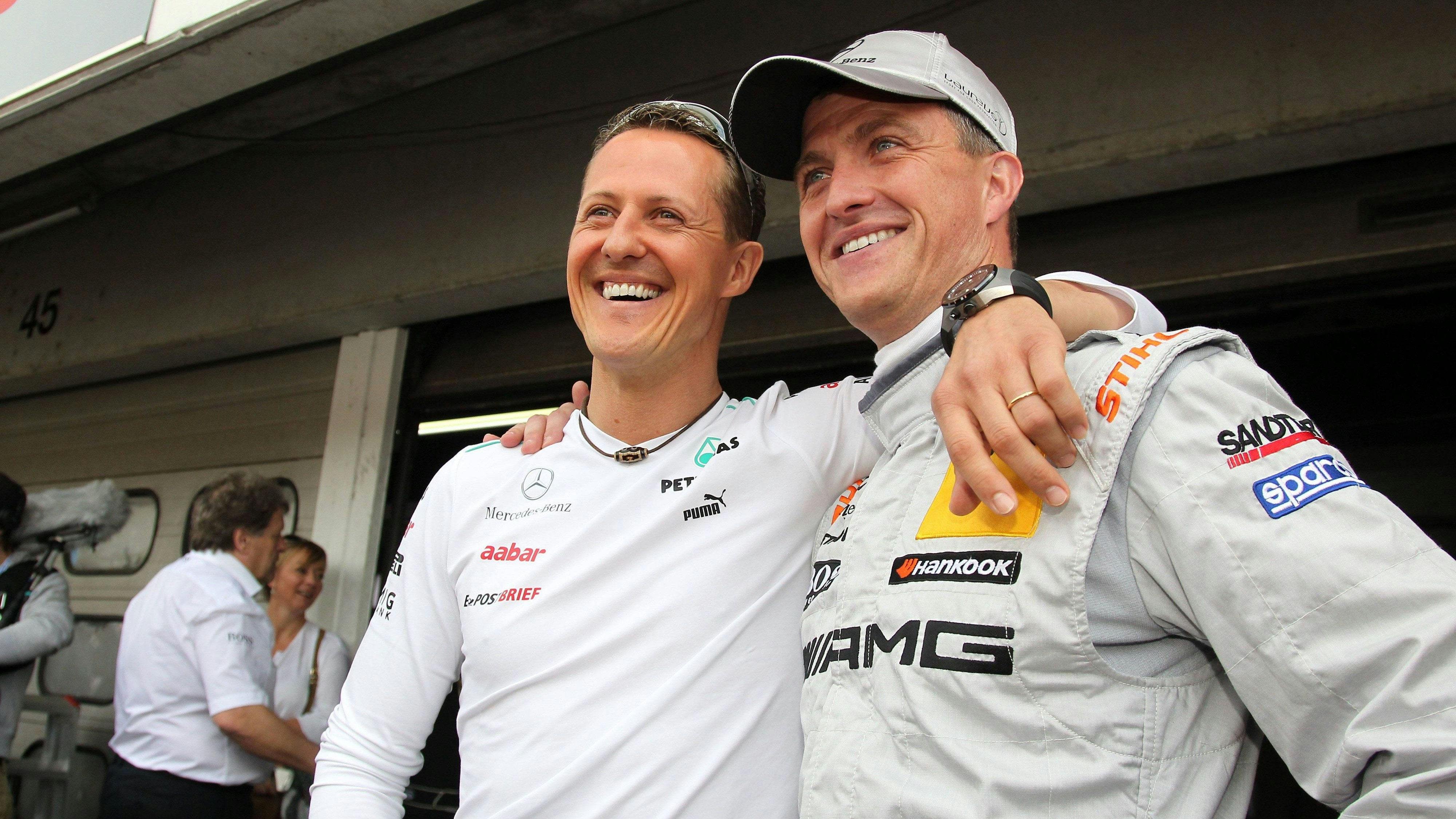 Michael und Ralf Schumacher 2012 bei einem DTM-Rennen in Hockenheim.