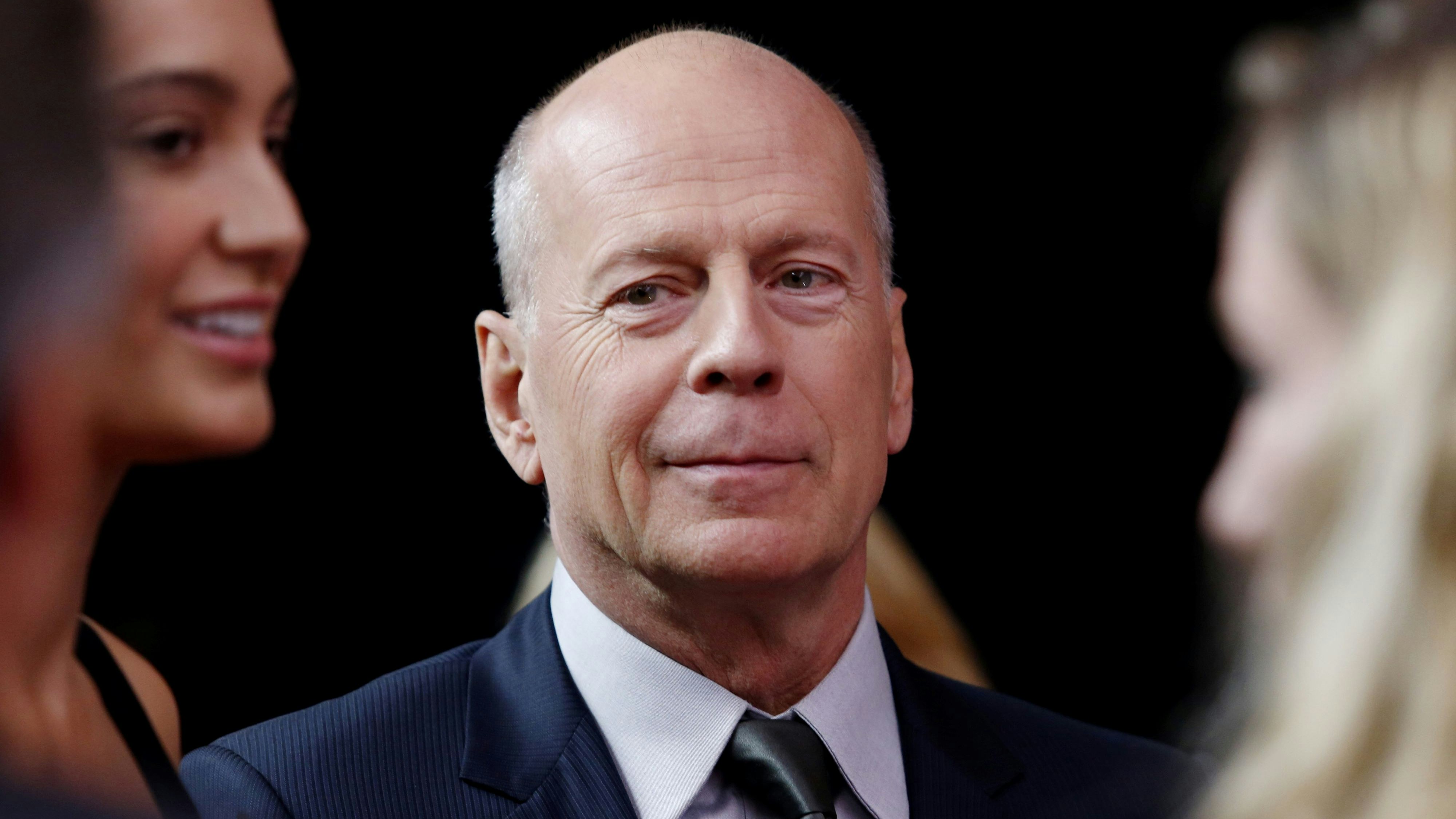 Actor Bruce Willis arrives on the red carpet for “Tony Bennett Celebrates 90: The Best Is Yet to Come" in 2016.