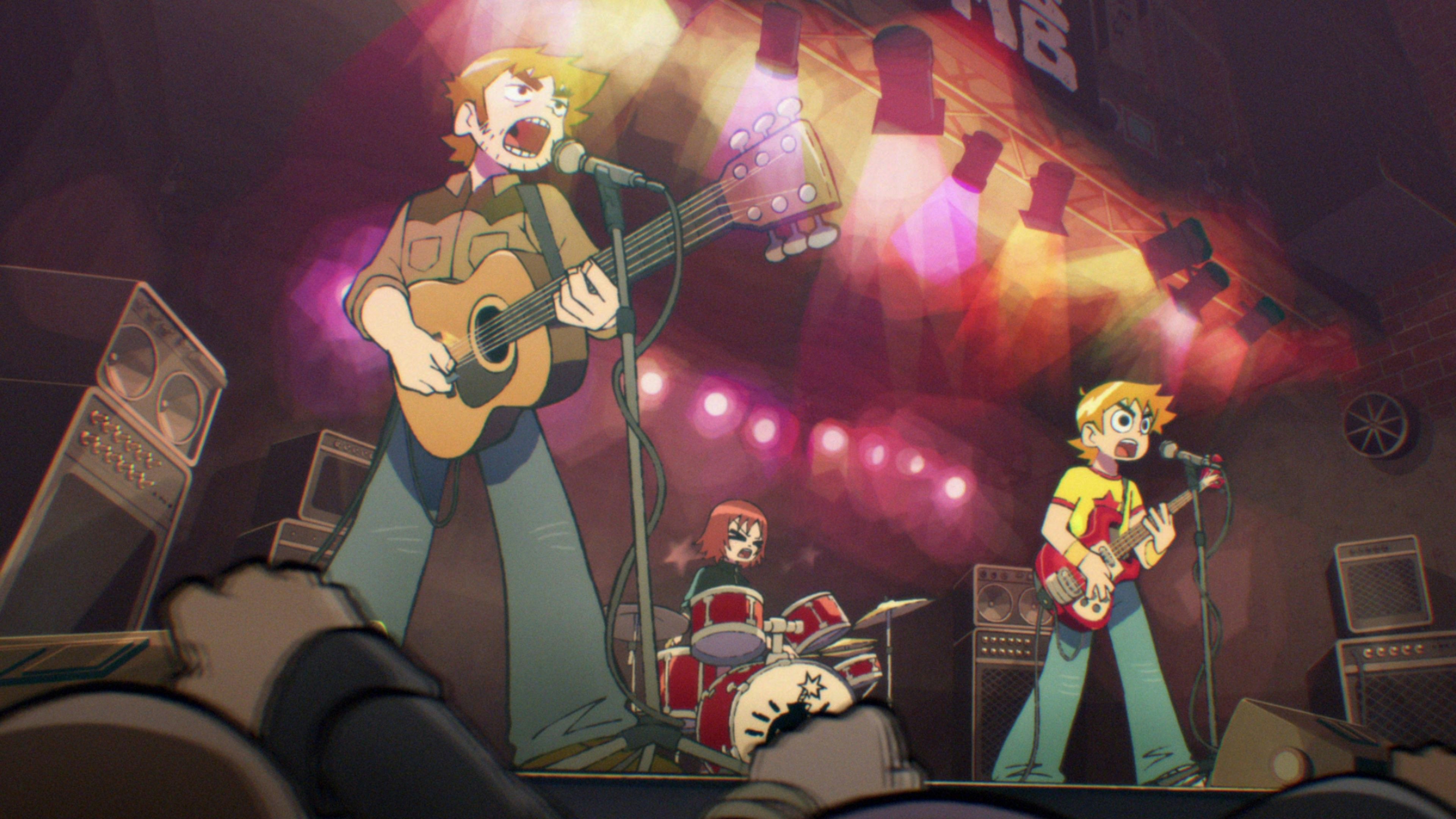 Scott Pilgrim Takes Off (L to R) Mark Webber as Stephen Stills, Alison Pill as Kim Pine and Michael Cera as Scott Pilgrim in Scott Pilgrim Takes Off. Cr. COURTESY OF NETFLIX © 2023