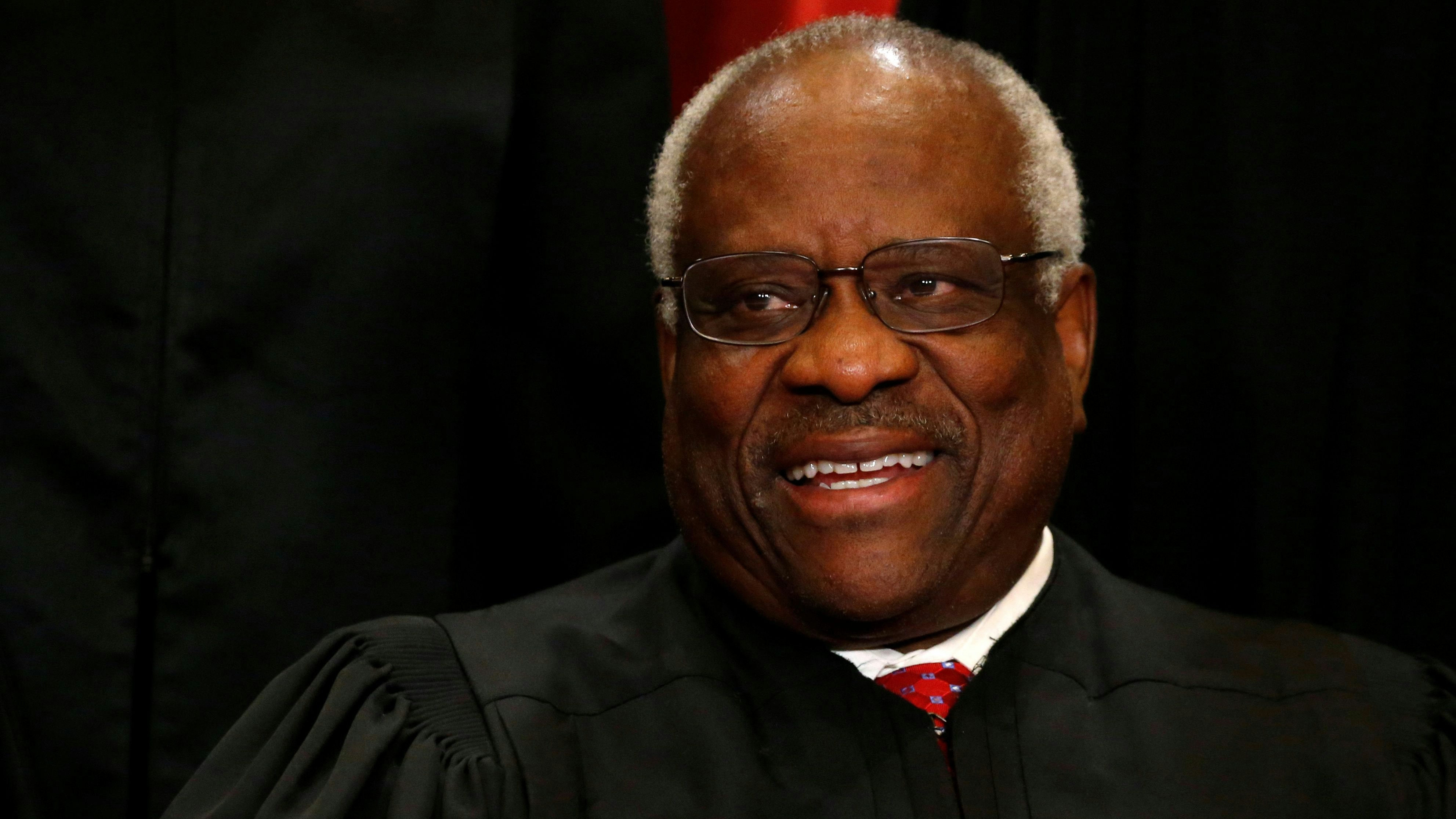 U.S. Supreme Court Justice Clarence Thomas participates in taking a new family photo with his fellow justices at the Supreme Court building in Washington, D.C., U.S., June 1, 2017. REUTERS/Jonathan Ernst