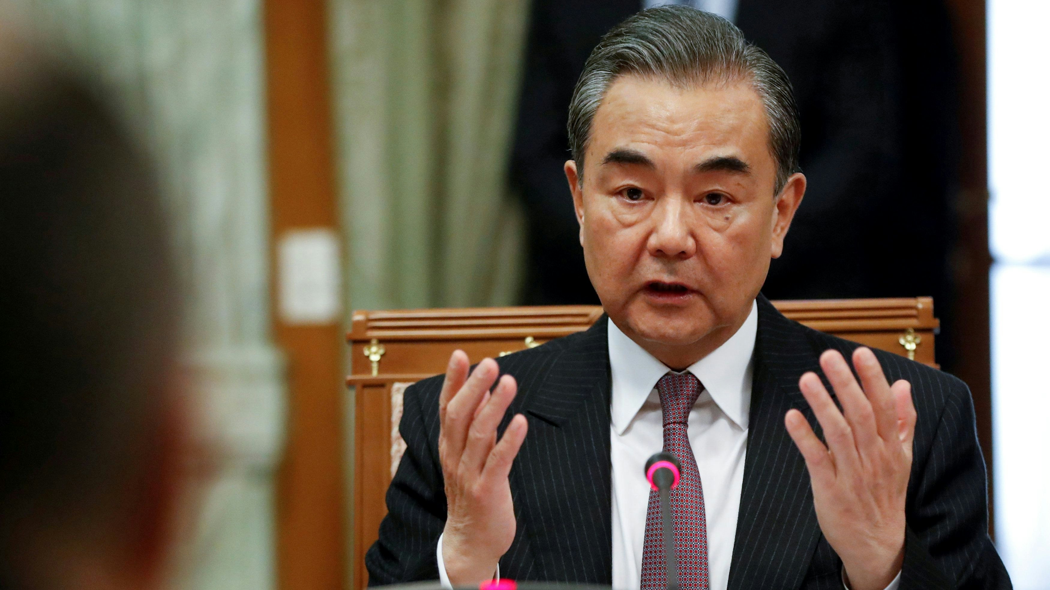 Chinese Foreign Minister Wang Yi gestures while speaking to Russian Foreign Minister Sergey Lavrov during their talks in Sochi, Russia May 13, 2019. Pavel Golovkin/Pool via REUTERS