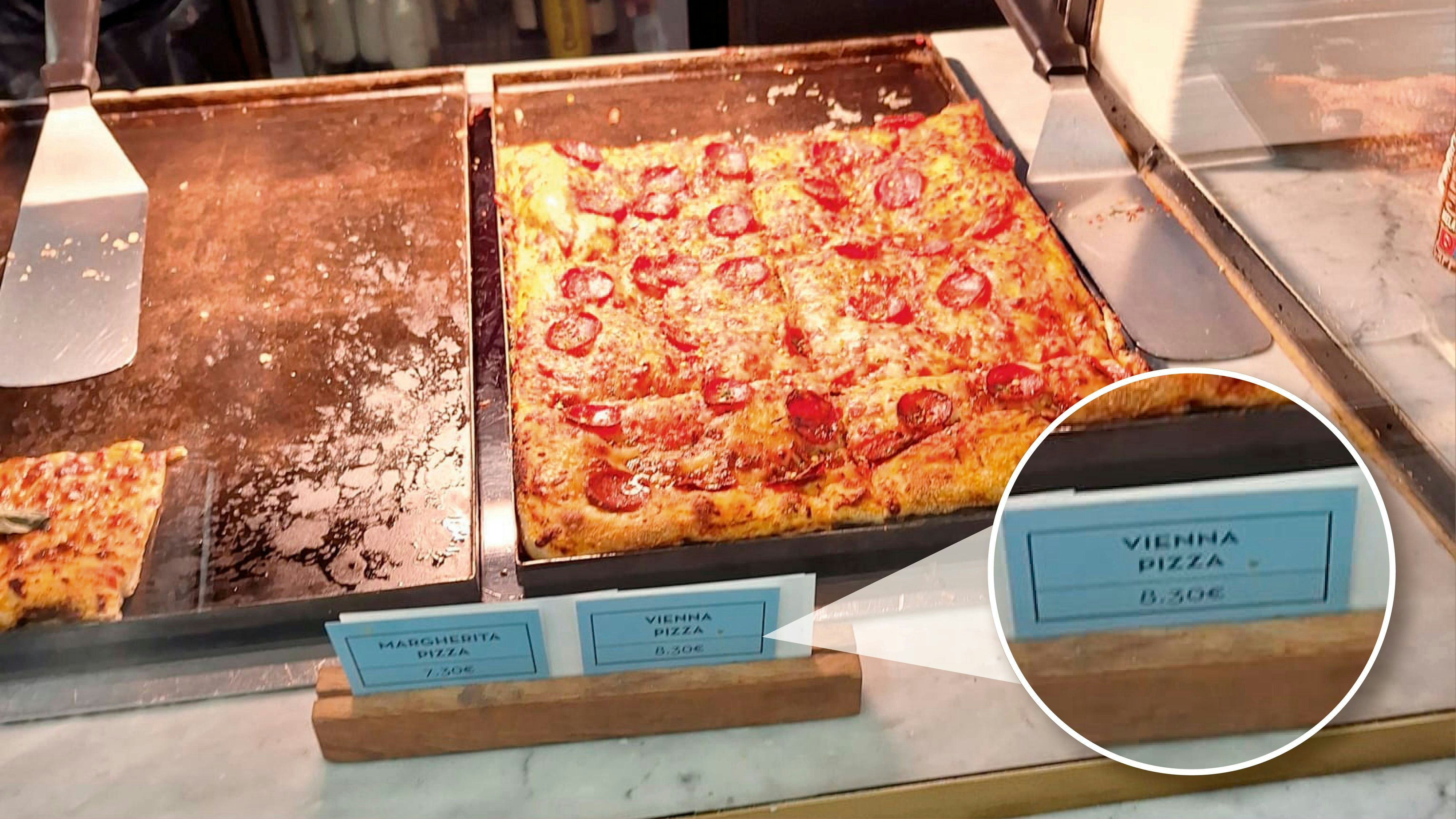 Am Wiener Airport wird ein Stück "Vienna Pizza" mit Salami um 8,30 Euro angeboten.