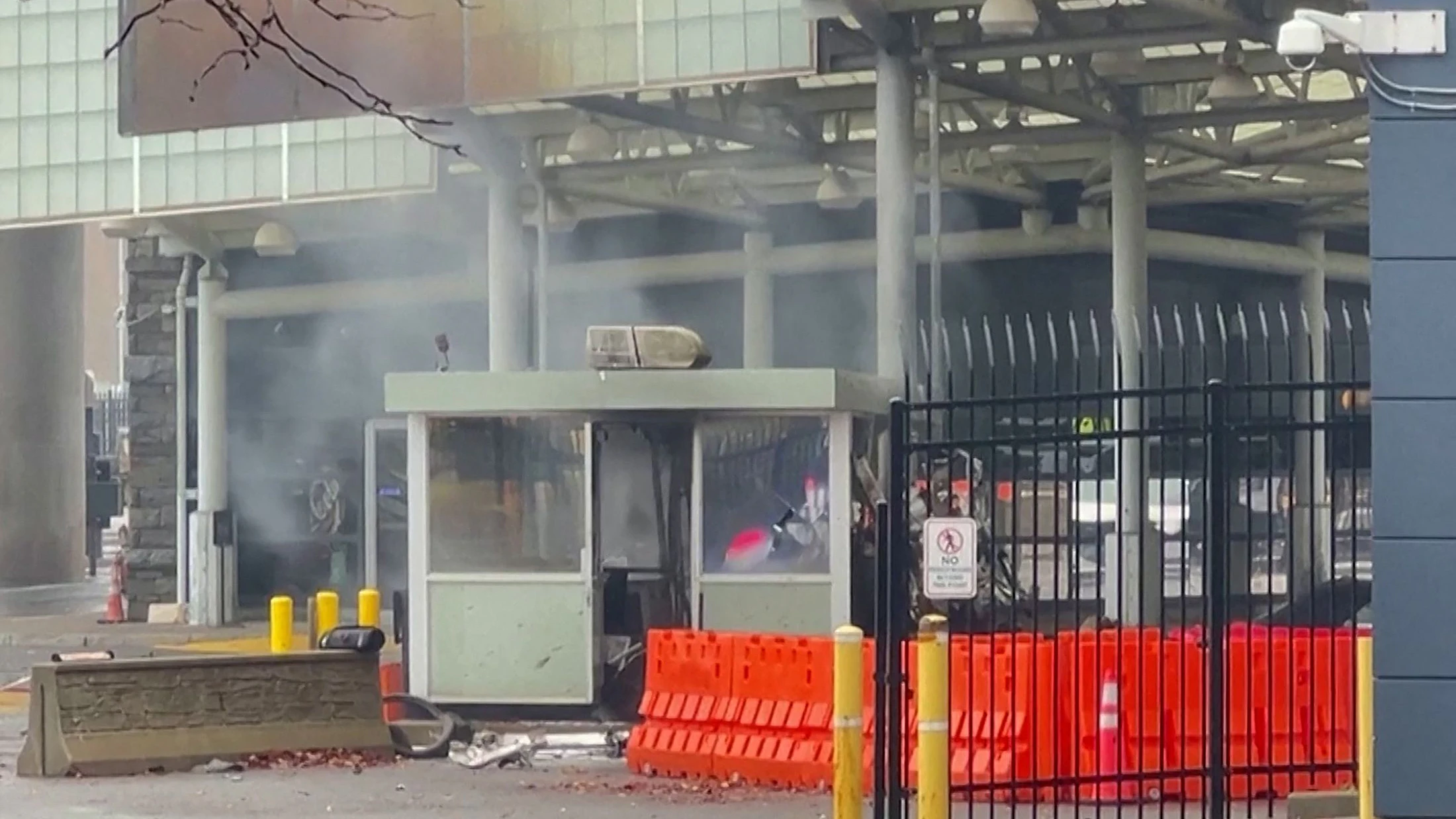 Smoke lingers after an incident at the Rainbow Bridge U.S. border crossing with Canada, in Niagara Falls, New York, U.S. November 22, 2023 in a still image from video.  REUTERS/Reuters TV