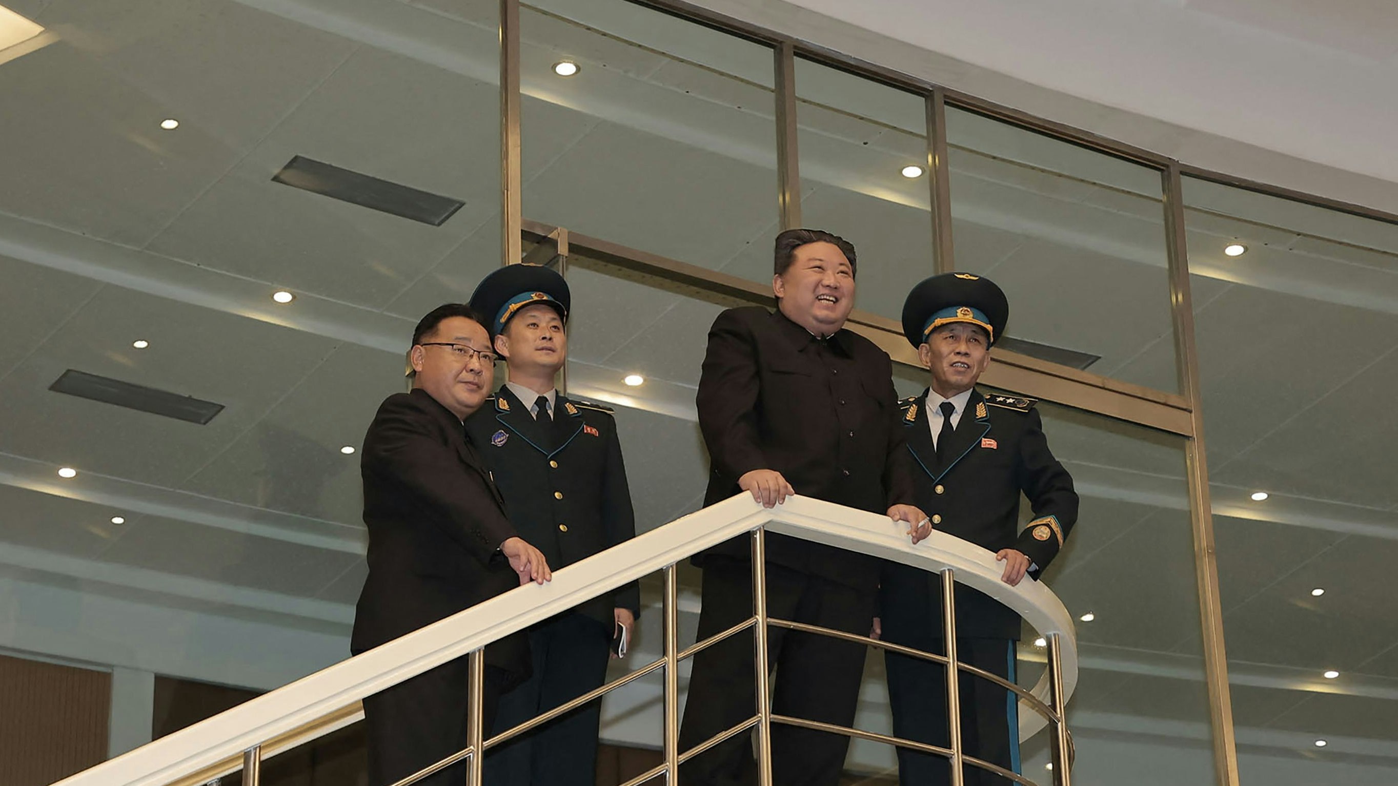 Download von www.picturedesk.com am 23.11.2023 (14:59).  *** SERVICEBILD *** TOPSHOT - This picture taken and released on November 22, 2023 from North Korea's official Korean Central News Agency (KCNA) shows North Korea's leader Kim Jong Un (2nd R) visiting the Pyongyang General Control Centre of the Korean National Aerospace Technology Directorate, a day after the launch of a rocket carrying the reconnaissance satellite 'Malligyong-1', in Pyongyang. North Korea said on November 22 it had succeeded in putting a military spy satellite in orbit after two previous failures, as the US led its allies in condemning the launch as a "brazen violation" of UN sanctions. (Photo by KCNA VIA KNS / AFP) / South Korea OUT / REPUBLIC OF KOREA OUT.---EDITORS NOTE--- RESTRICTED TO EDITORIAL USE - MANDATORY CREDIT "AFP PHOTO/KCNA VIA KNS" - NO MARKETING NO ADVERTISING CAMPAIGNS - DISTRIBUTED AS A SERVICE TO CLIENTS / THIS PICTURE WAS MADE AVAILABLE BY A THIRD PARTY. AFP CAN NOT INDEPENDENTLY VERIFY THE AUTHENTICITY, LOCATION, DATE AND CONTENT OF THIS IMAGE --- / - 20231122_PD2981 - Rechteinfo: Servicebild (SB) Bei diesem Bild ist PictureDesk ausschließlich technischer Dienstleister und stellt eine technische Bearbeitungsgebühr in Rechnung. PictureDesk ist weder Urheber noch Rechteinhaber. Die Nutzung liegt in alleiniger Verantwortung des Kunden. Nur für redaktionelle Nutzung! Werbliche Nutzung erfordert Freigabe: bitte schicken Sie uns eine Anfrage.