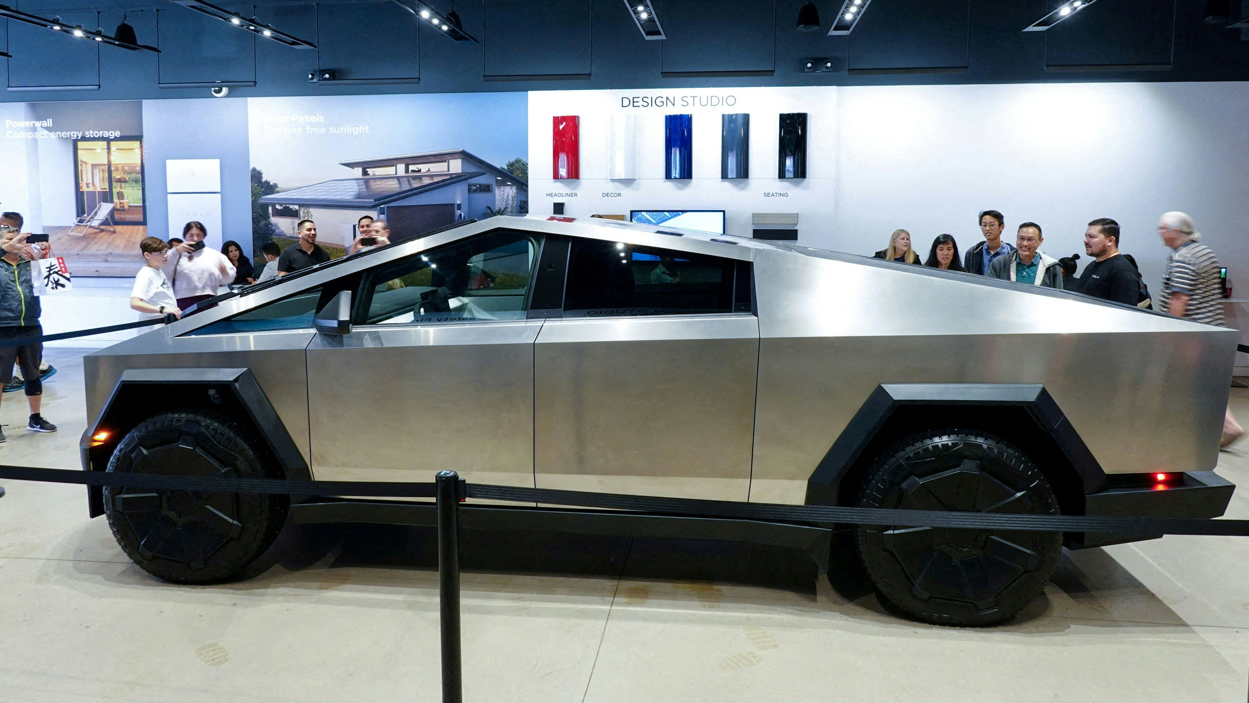FILE PHOTO: Tesla's new Cybertruck is shown on display at a Tesla store in San Diego, California, U.S., November 20, 2023.  REUTERS/Mike Blake/File Photo