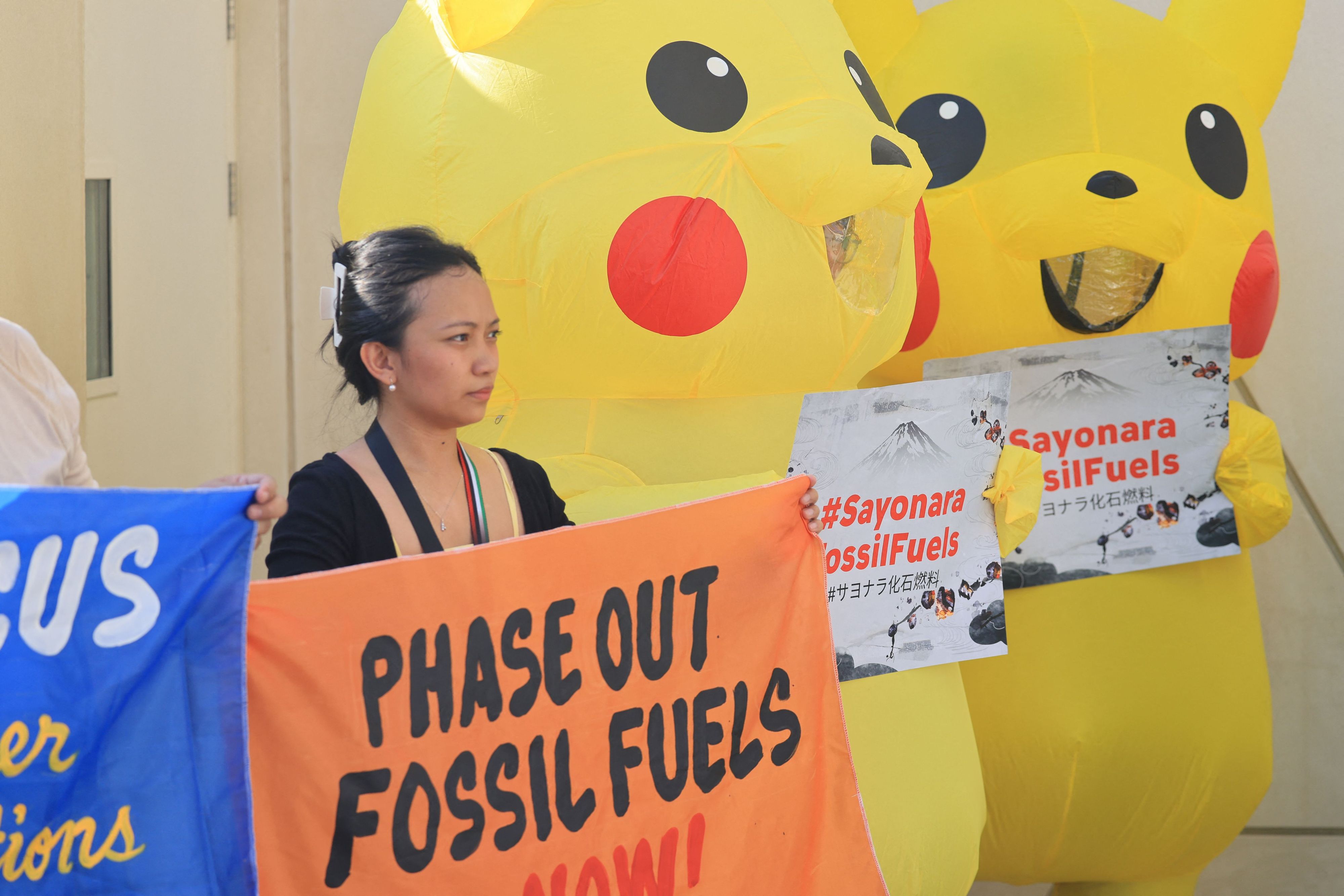 Protestierende bei der Weltklimakonferenz COP28 in Dubai.