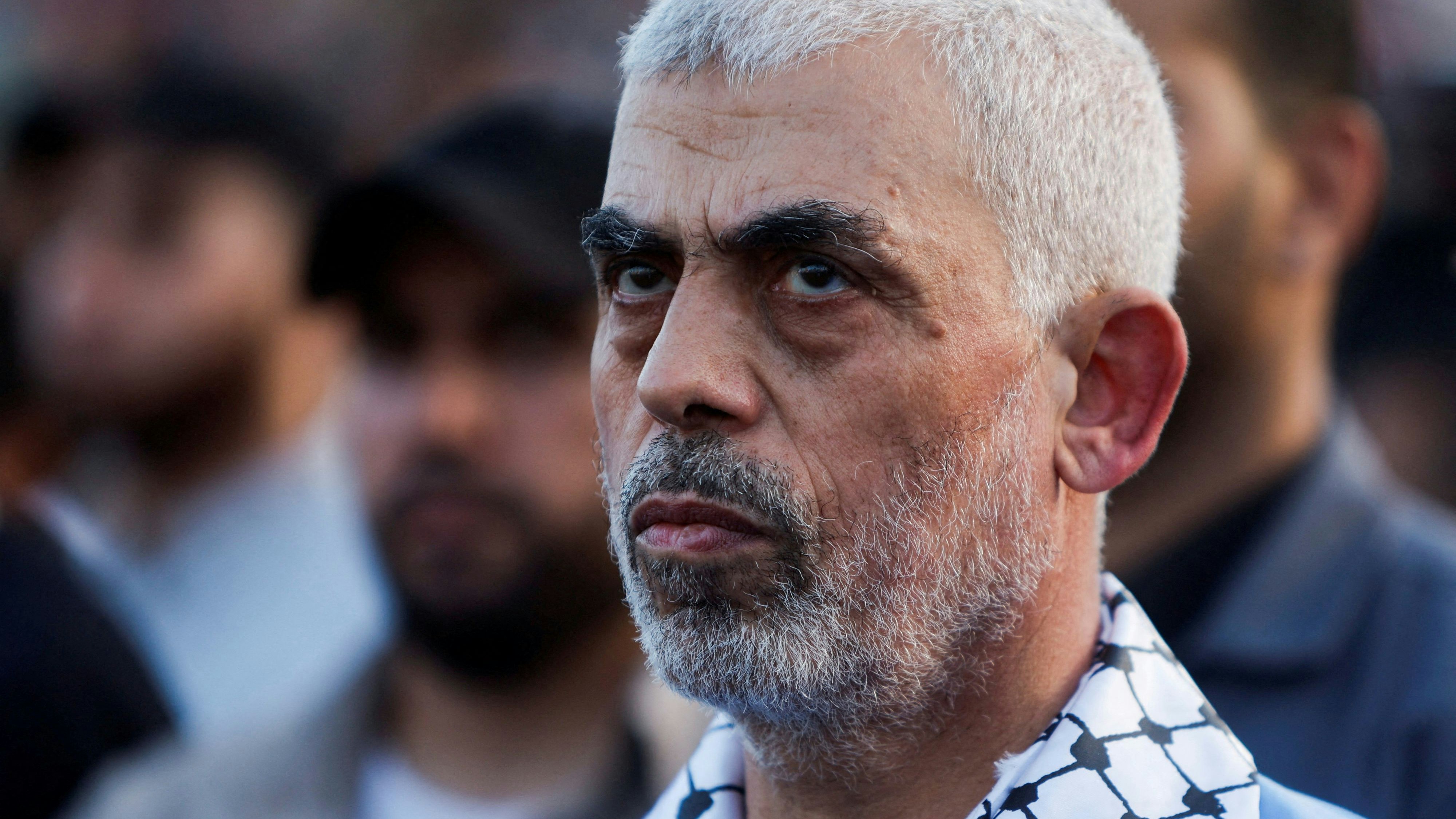 FILE PHOTO: Hamas leader Yehya Al-Sinwar looks on as palestinians Hamas supporters take part in an anti-Israel rally over tension in Jerusalem's Al-Aqsa mosque, in Gaza City October 1, 2022. REUTERS/Mohammed Salem/File Photo