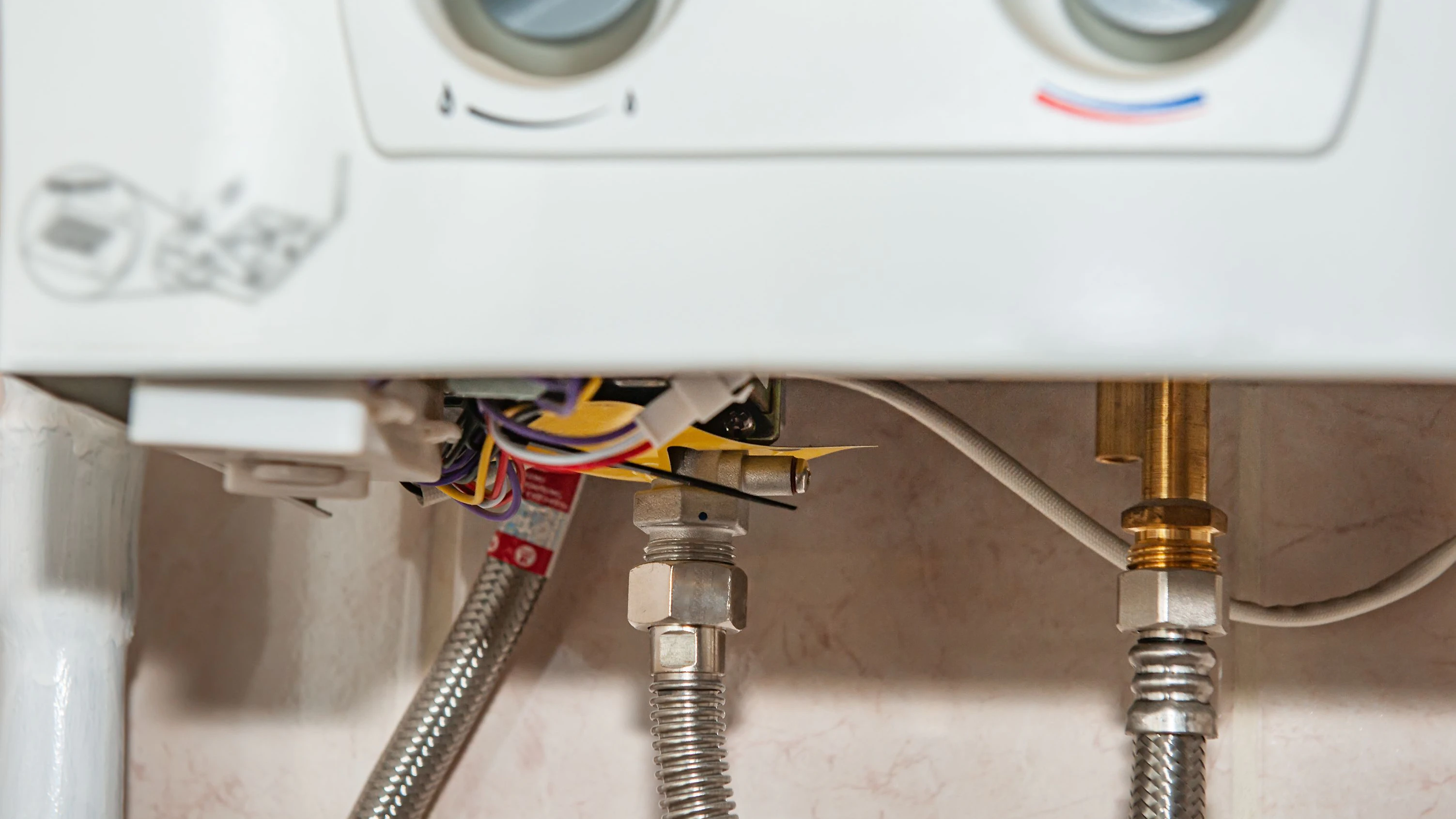 The hot water connection of the gas equipment in the house. Engineering water heating, clean gas pipeline of the heating system in the building.